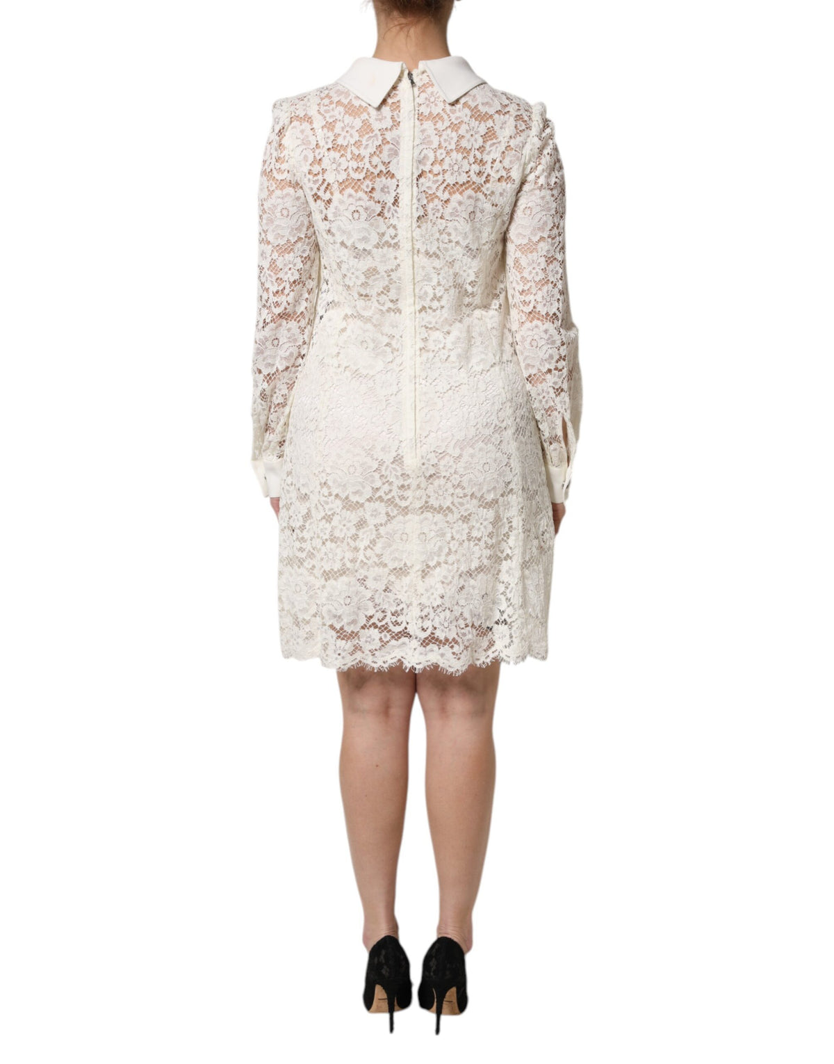 Discover the exquisite Dolce & Gabbana White Floral Lace Long Sleeves Shift Dress, a masterpiece of Italian craftsmanship that embodies timeless elegance and allure.
