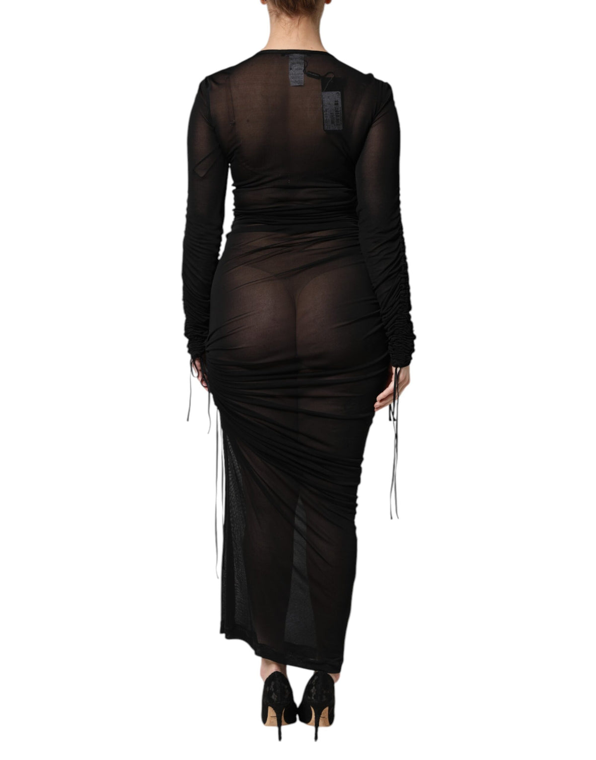 Experience the allure of the Dolce & Gabbana Black Mesh Trim Bodycon Long Sheath Dress, a masterful blend of silk and viscose, embodying timeless elegance and luxurious craftsmanship for the discerning individual.
