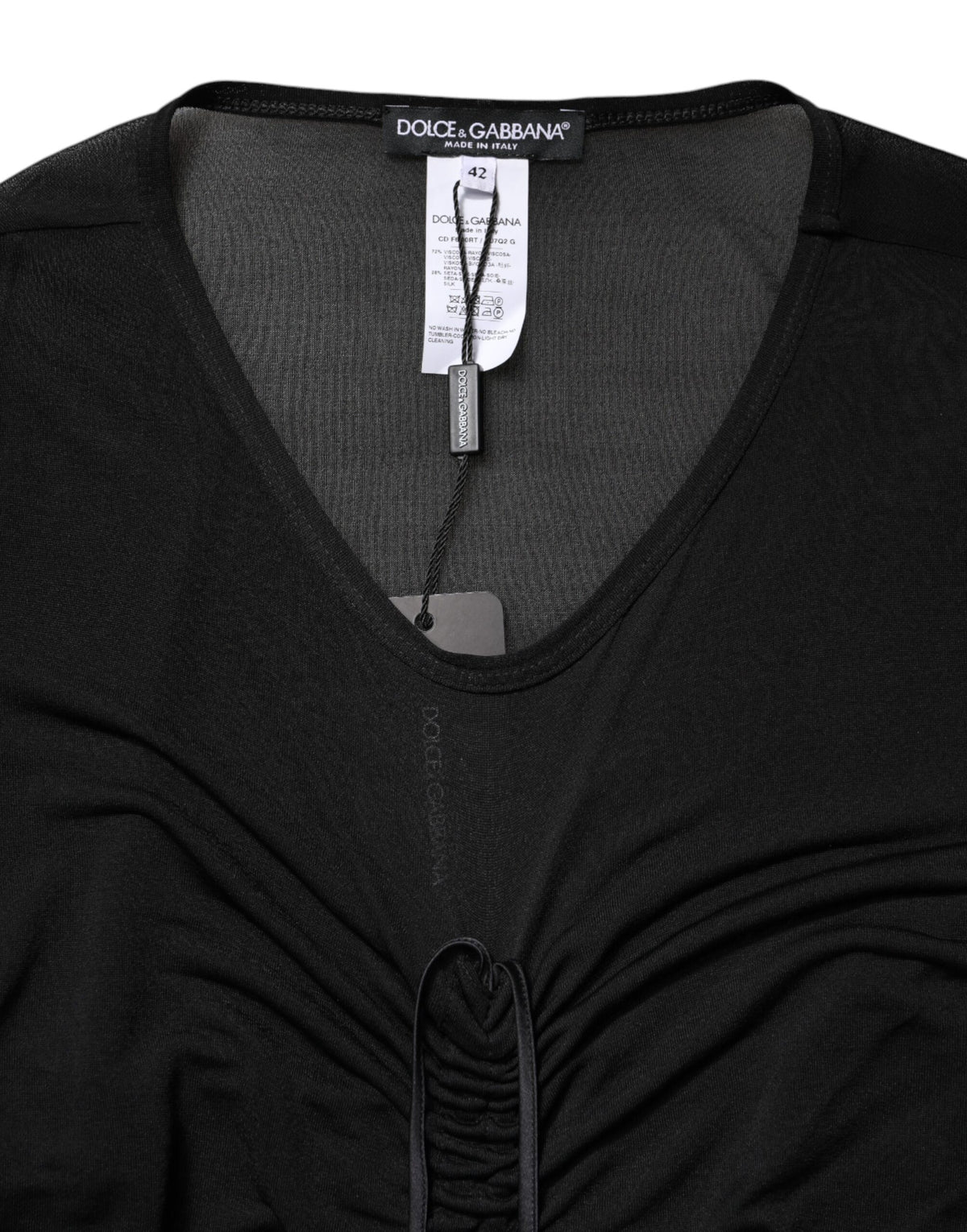 Indulge in the exquisite Dolce & Gabbana Black Mesh Trim Bodycon Long Sheath Dress, crafted from luxurious silk and viscose, embodying timeless elegance for the discerning individual.