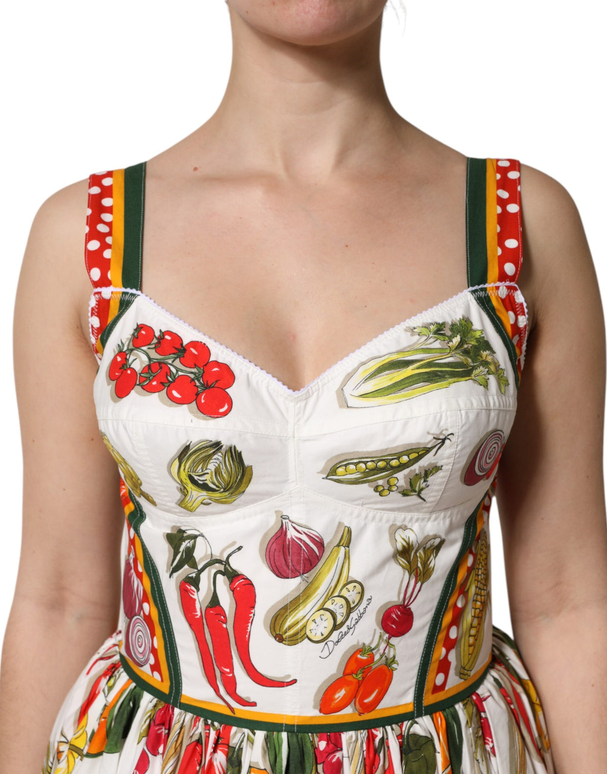 Discover the exquisite Dolce & Gabbana White Vegetables Sleeveless A-line Dress, a masterpiece of 100% cotton craftsmanship that embodies timeless elegance and sophistication.