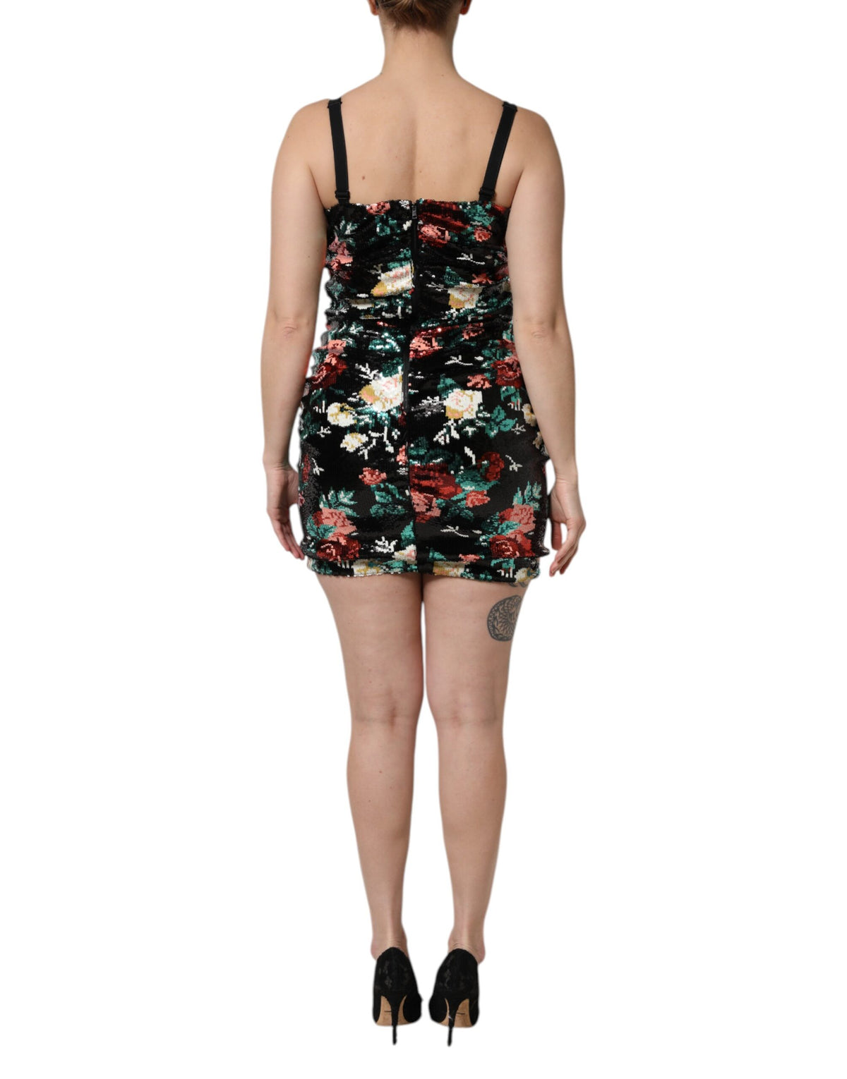 Elevate your allure with the Dolce & Gabbana Black Floral Sequin Sleeveless Sheath Dress, a masterpiece of silk and polyester that embodies timeless elegance and sophisticated craftsmanship.