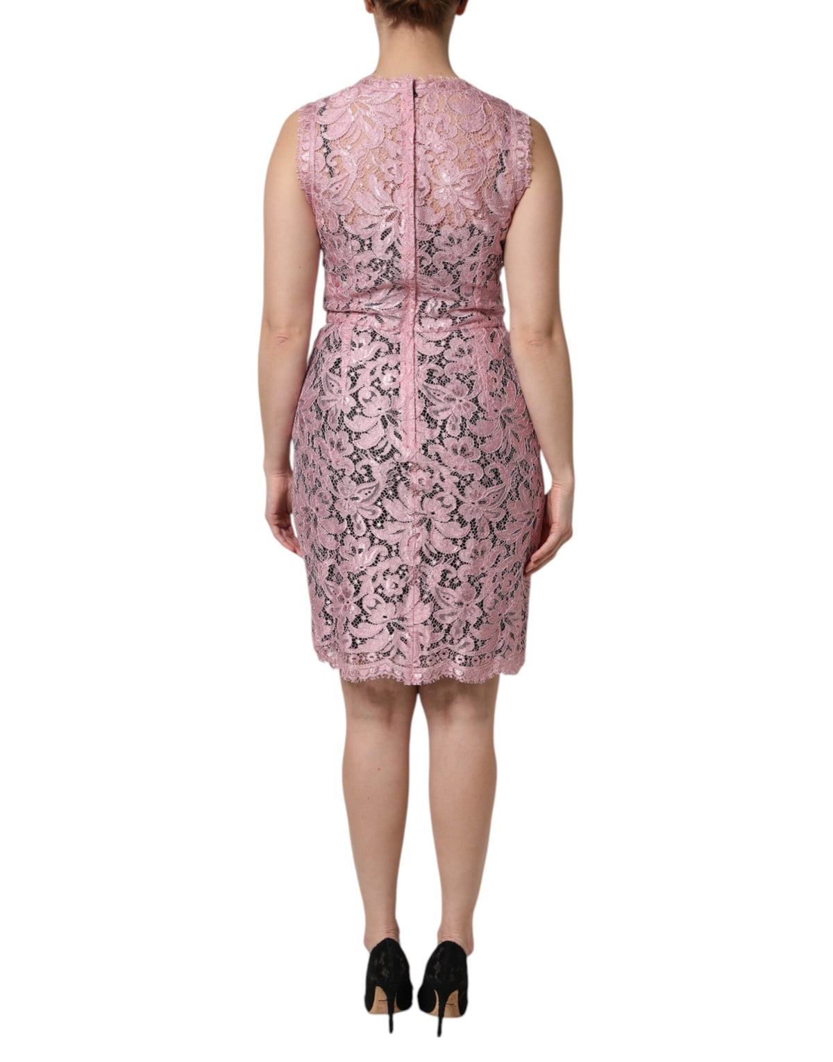 Indulge in the exquisite Dolce & Gabbana Pink Floral Lace Sleeveless Sheath Dress, where luxurious materials and impeccable craftsmanship redefine timeless elegance for the discerning individual.