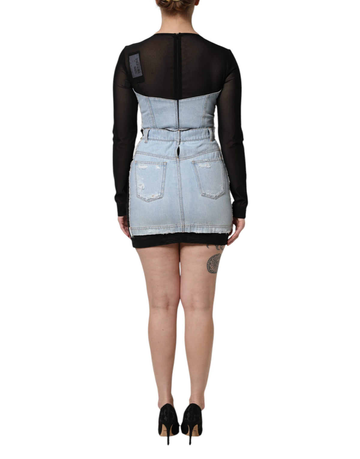 Experience the allure of the Dolce & Gabbana Black Blue Long Sleeves Denim Mini Dress, a masterpiece of Italian craftsmanship that elevates your style with luxurious elegance.