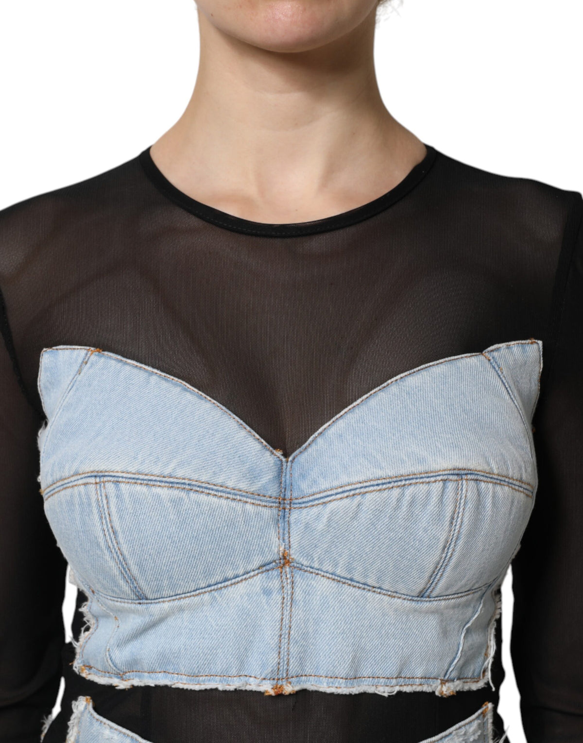 Indulge in the exquisite allure of the Dolce & Gabbana Black Blue Long Sleeves Denim Mini Dress, a masterpiece of Italian craftsmanship that embodies luxury and sophistication.