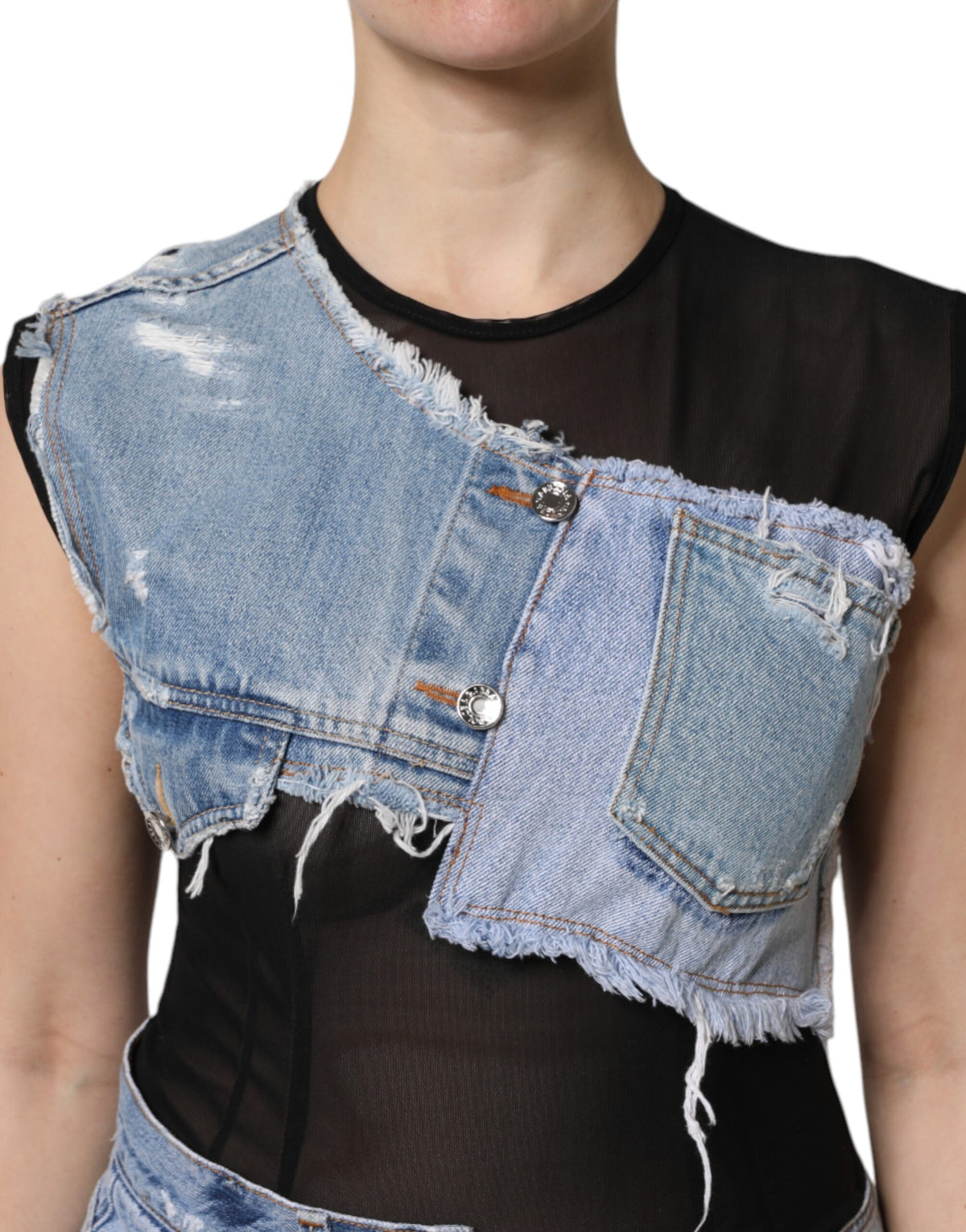 Elevate your wardrobe with the Dolce & Gabbana Black Blue Sleeveless Denim Mini Dress, a masterpiece of Italian craftsmanship that embodies sensual sophistication and timeless allure.