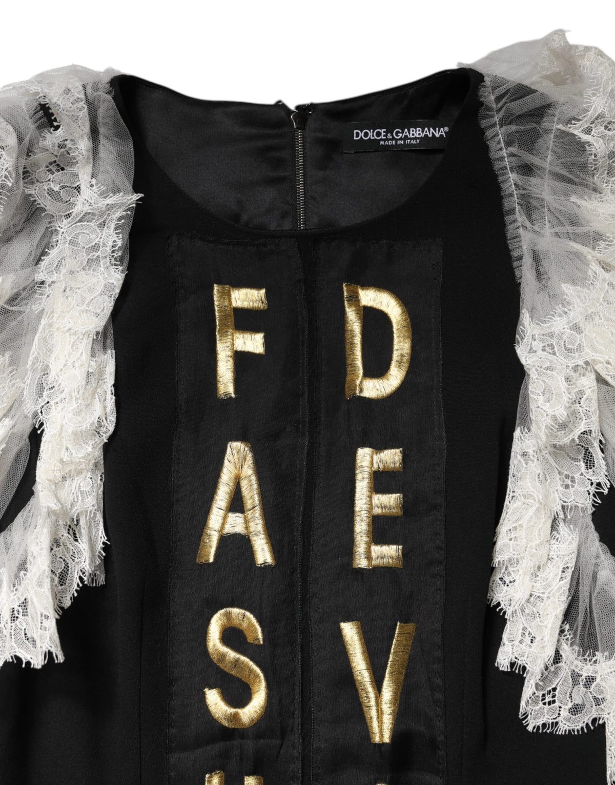 Indulge in the exquisite allure of the Dolce & Gabbana Black Fashion Devotion Embellish Mini Dress, a timeless masterpiece crafted from luxurious materials, perfect for elevating your sophisticated wardrobe.