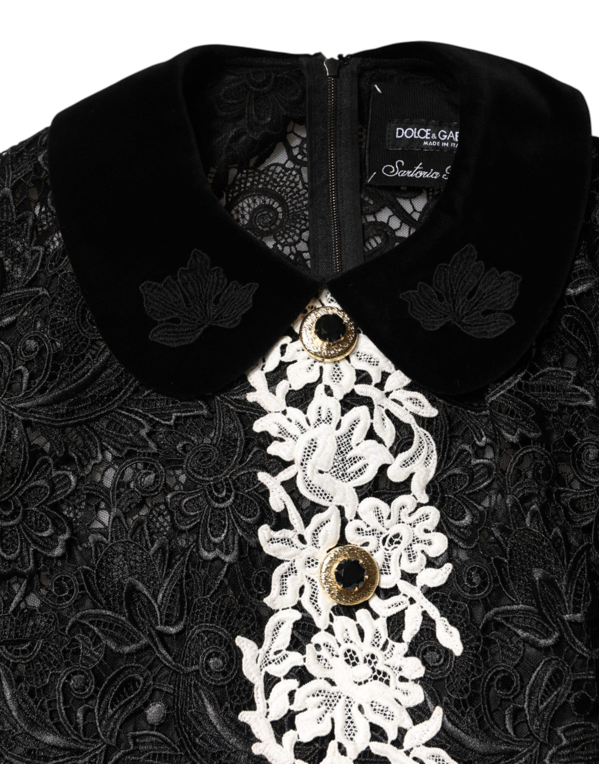 Indulge in the exquisite craftsmanship of the Dolce & Gabbana Black Floral Lace Embellished Mini Dress, a timeless piece that embodies luxury and sophistication for any occasion.