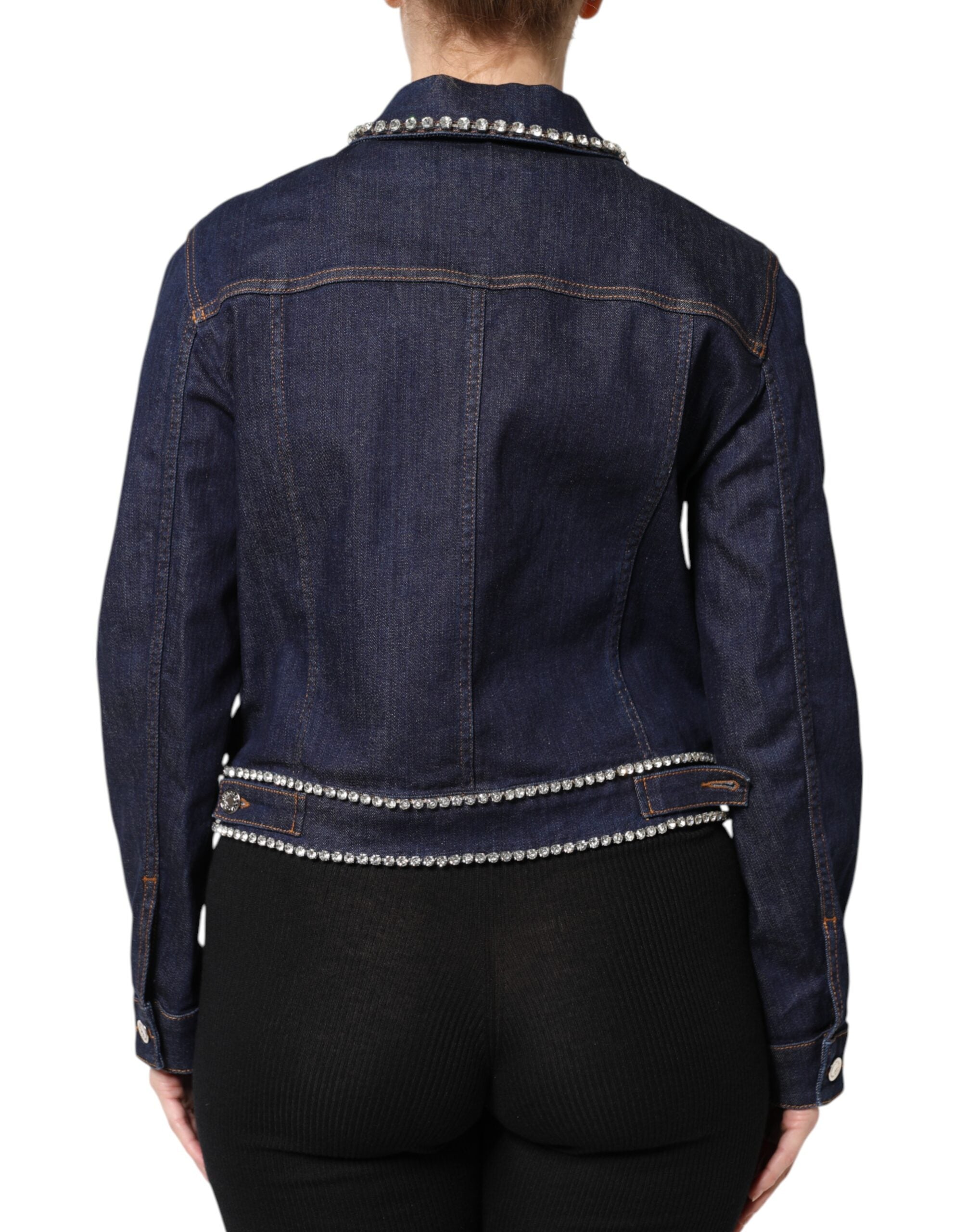 Elevate your wardrobe with the Dolce & Gabbana Blue Denim Cotton Crystal Embellished Jacket, a masterpiece of Italian craftsmanship that embodies timeless elegance and sophistication.
