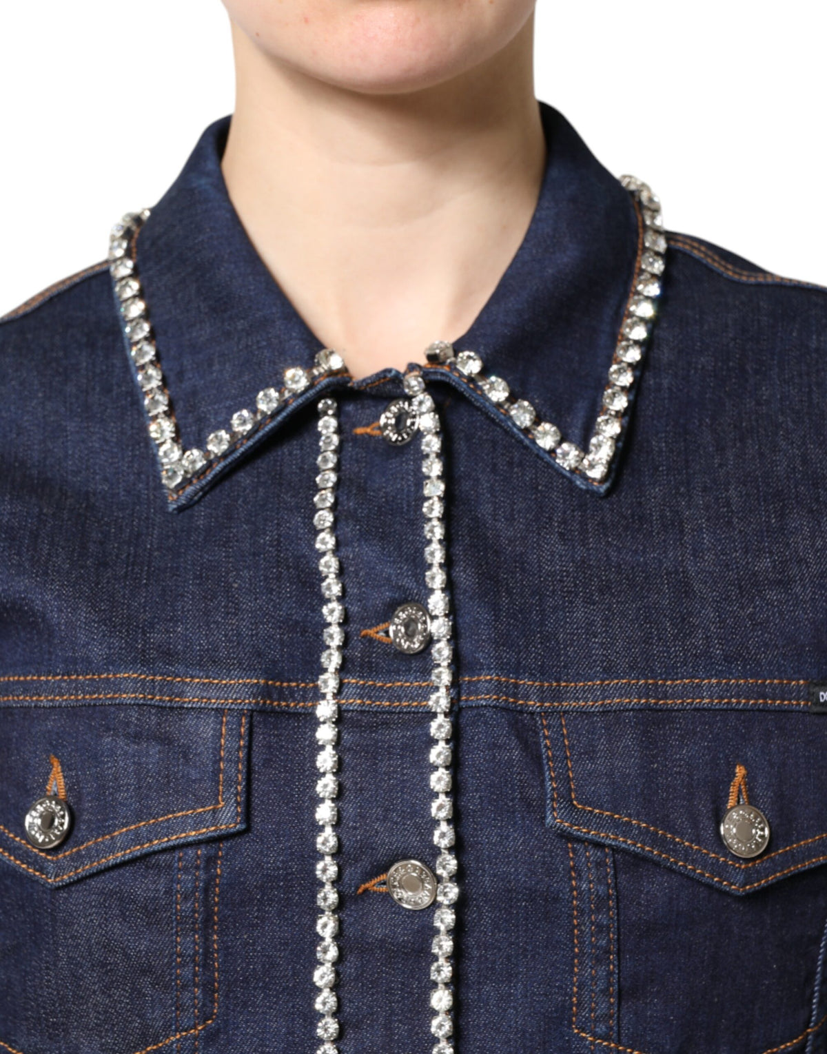 Elevate your wardrobe with the Dolce & Gabbana Blue Denim Cotton Crystal Embellished Jacket, a masterpiece of Italian craftsmanship that embodies timeless elegance and sophisticated allure.