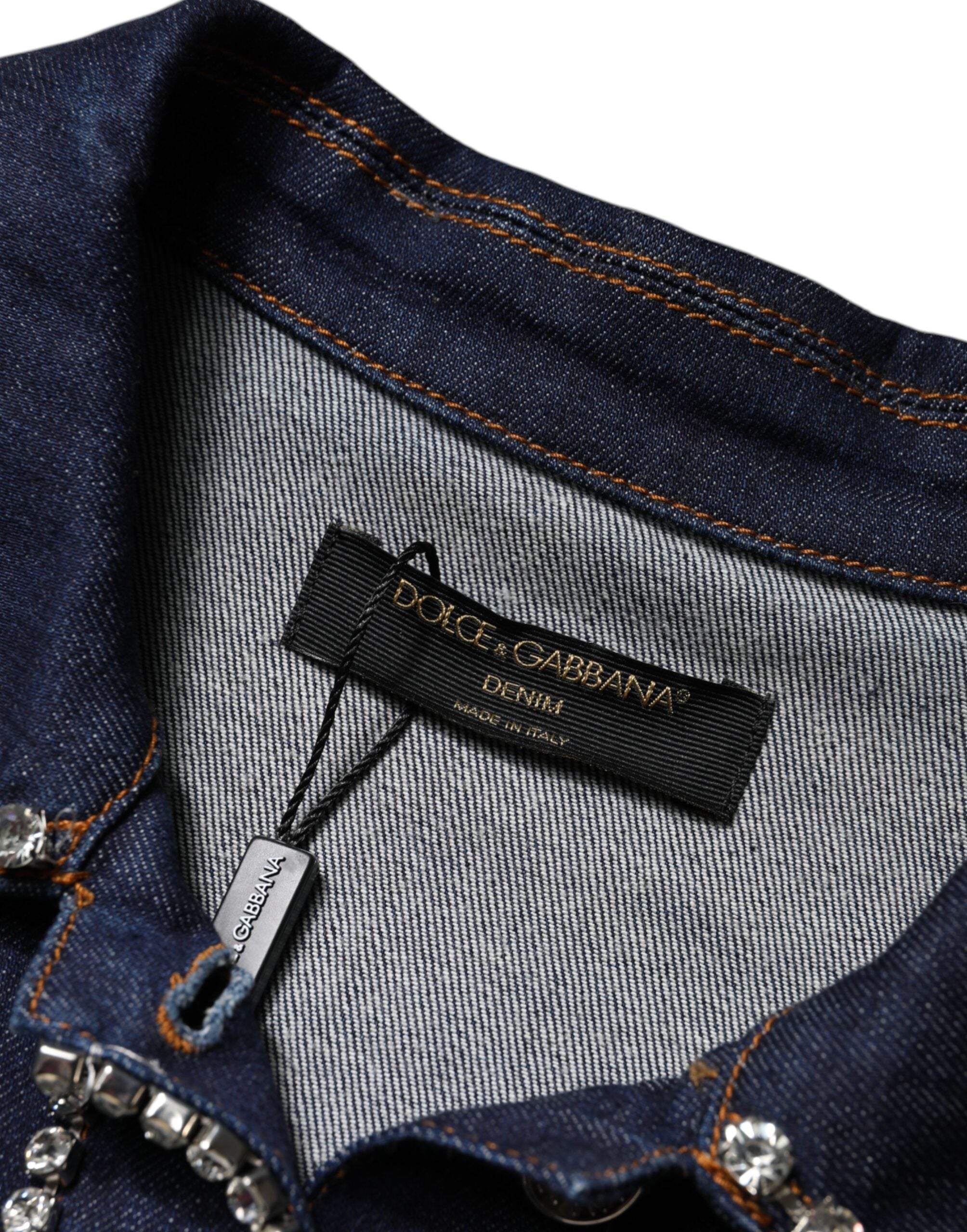 Elevate your wardrobe with the Dolce & Gabbana Blue Denim Cotton Crystal Embellished Jacket, a masterpiece of Italian craftsmanship that embodies timeless luxury and sophisticated elegance.