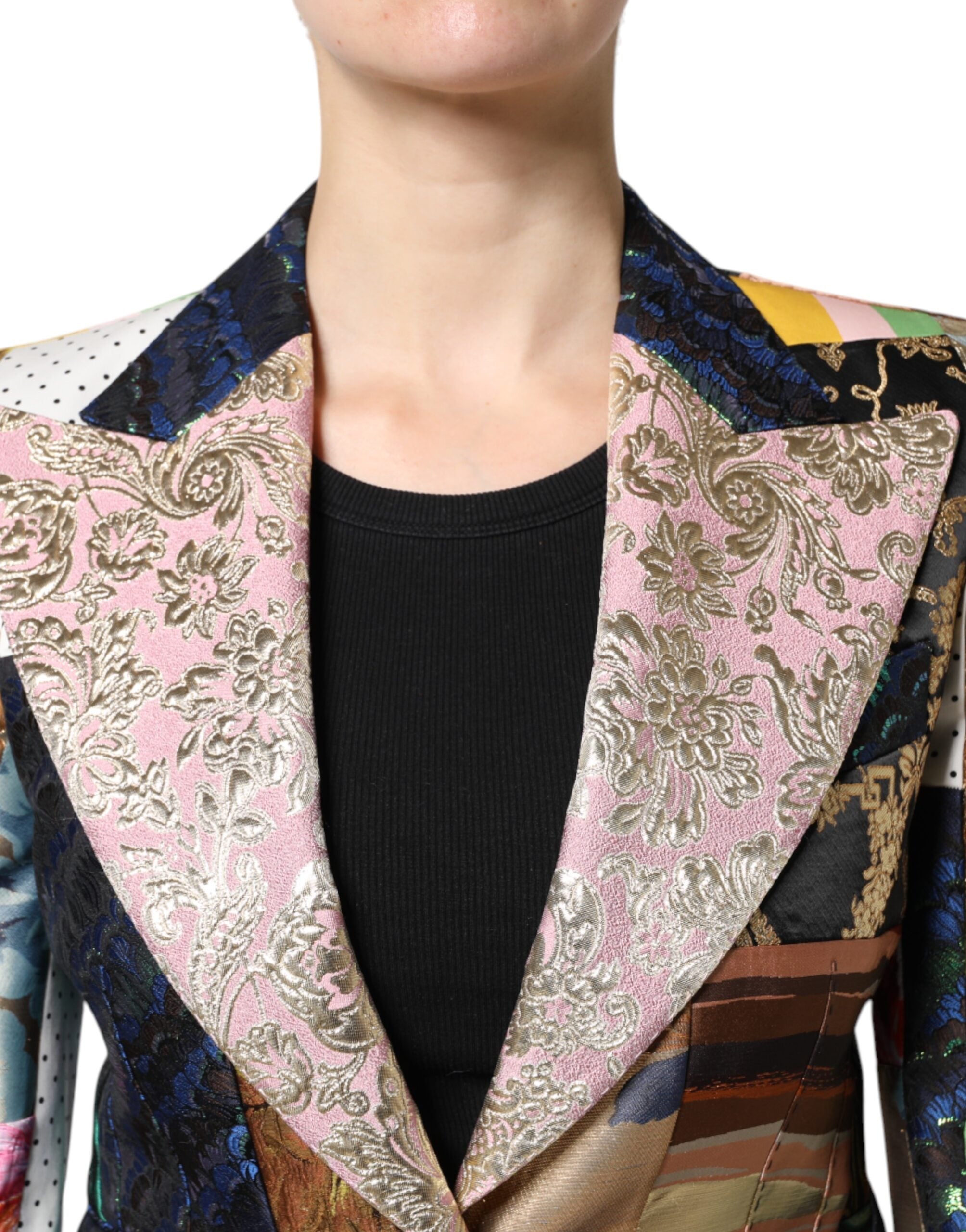 Indulge in the exquisite artistry of the Dolce & Gabbana Multicolor Floral Patchwork Jacquard Jacket, a luxurious statement piece crafted in Italy from rich fabrics, embodying sophistication and timeless elegance.