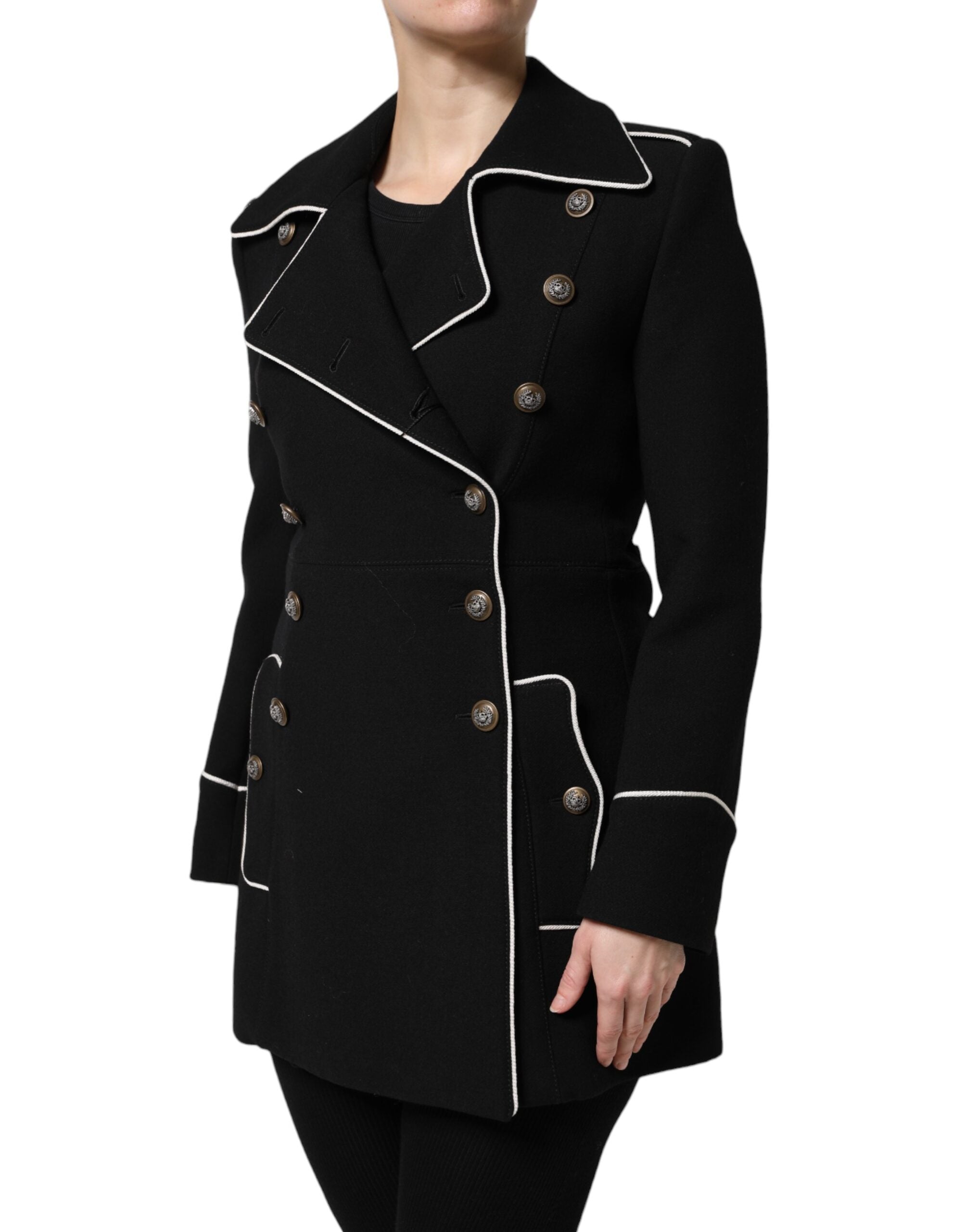 Experience the exquisite craftsmanship of the Dolce & Gabbana Black Wool Double Breasted Blazer, a timeless piece that embodies elegance and sophistication for the discerning individual.