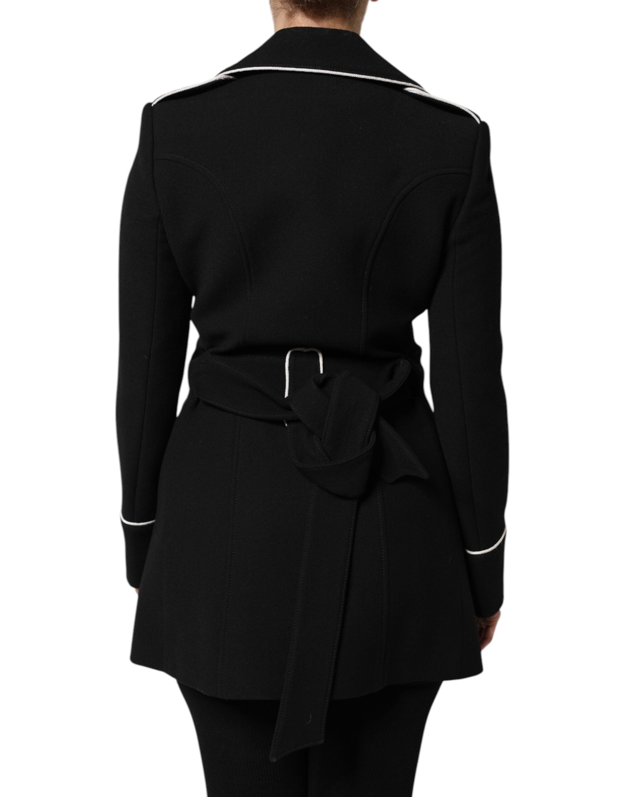 Elevate your style with the Dolce & Gabbana Black Wool Double Breasted Blazer, a masterpiece of Italian craftsmanship that embodies timeless elegance and sophistication.