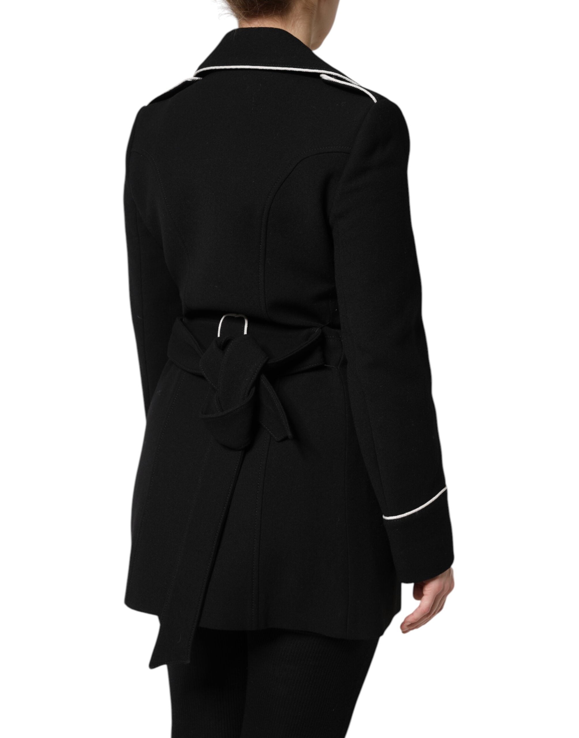 Indulge in the exquisite Dolce & Gabbana Black Wool Double Breasted Blazer, a timeless masterpiece of refined craftsmanship and luxurious materials, perfect for elevating any wardrobe.