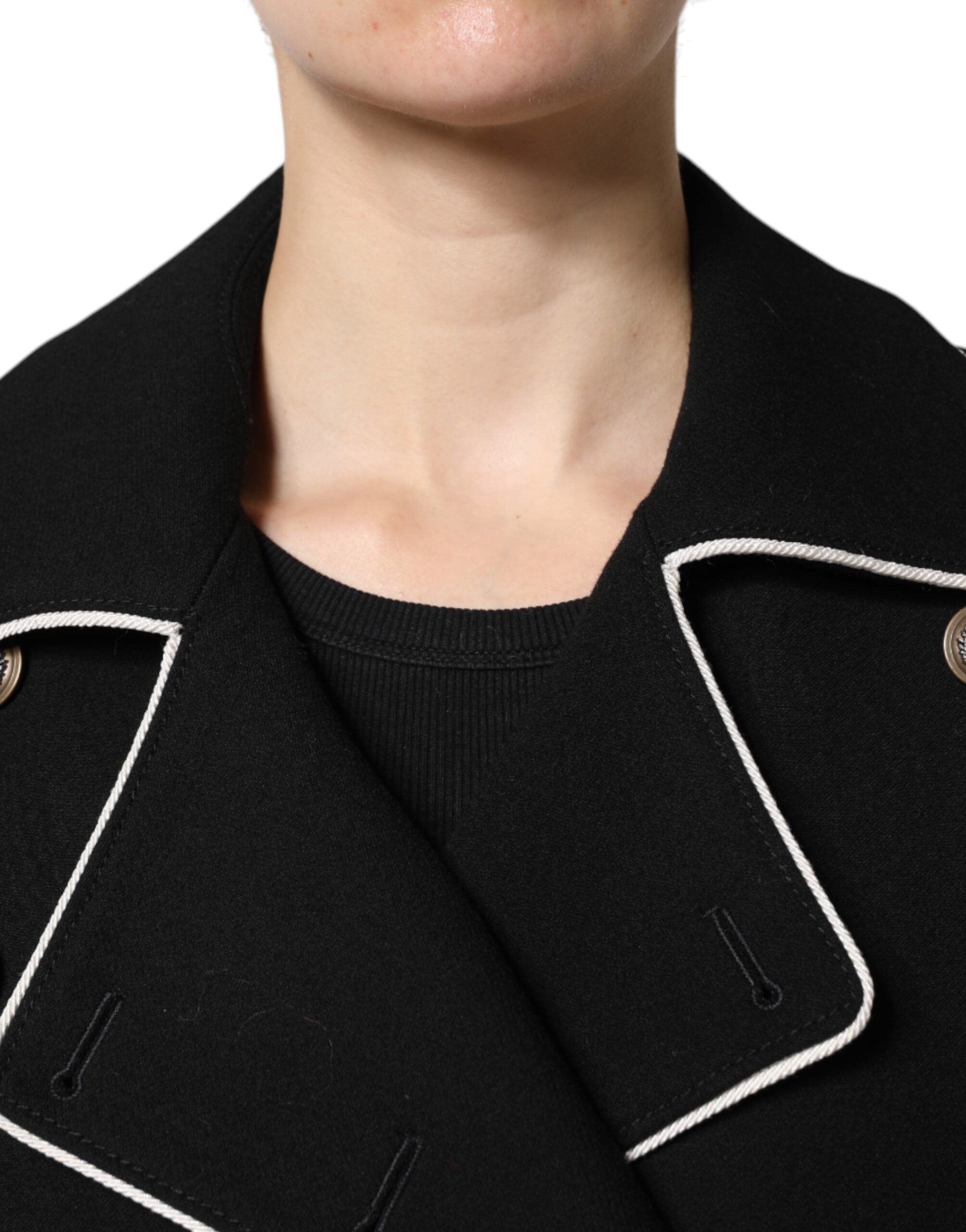 Indulge in the exquisite Dolce & Gabbana Black Wool Double Breasted Blazer, a timeless masterpiece of luxury and sophistication, crafted from premium virgin wool for unparalleled elegance.