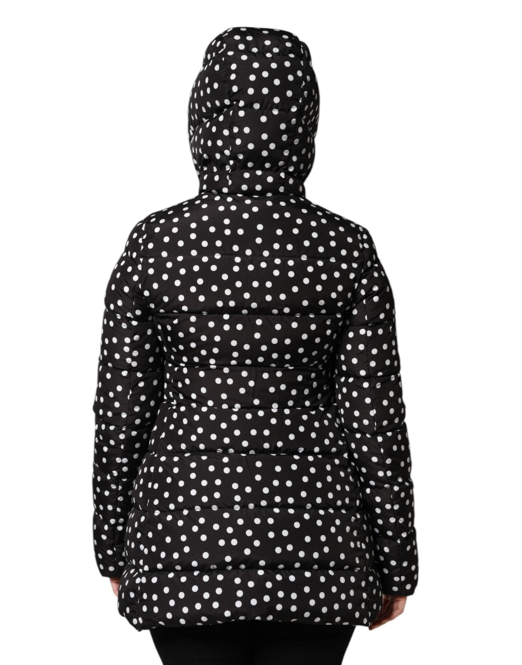 Indulge in the exquisite Dolce & Gabbana Black Puffer Hooded Zip Reversible Jacket, a luxurious blend of craftsmanship and sophistication, perfect for any discerning wardrobe.