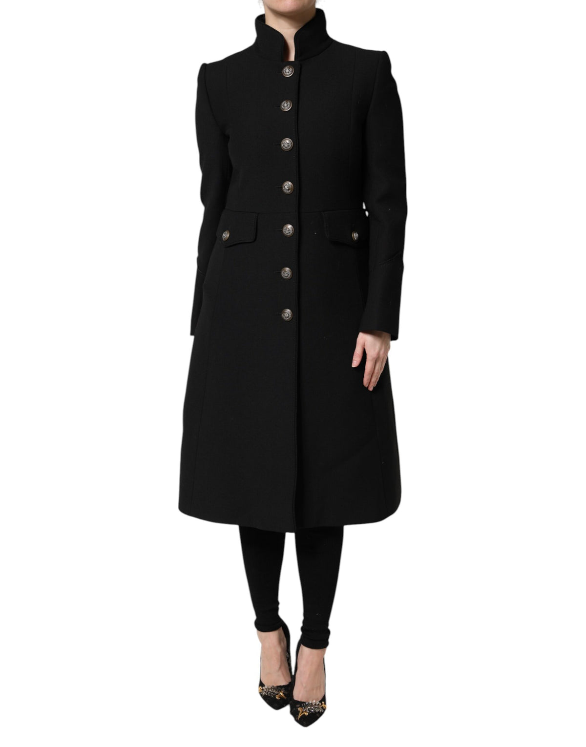 Elevate your wardrobe with the Dolce & Gabbana Black Wool Single Breasted Trench Coat, a masterpiece of Italian craftsmanship, blending luxury and sophistication for the discerning individual.
