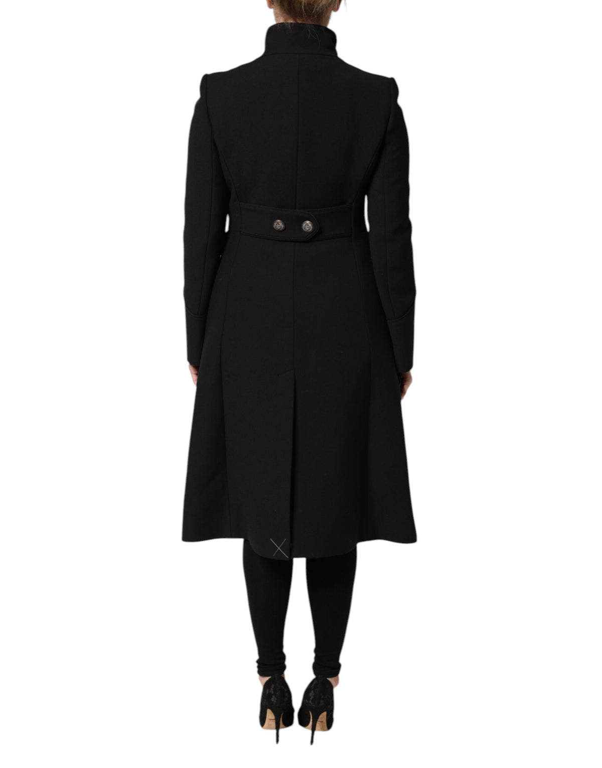 Indulge in the exquisite Dolce & Gabbana Black Wool Single Breasted Trench Coat, a masterpiece of Italian craftsmanship that embodies timeless elegance and sophistication.