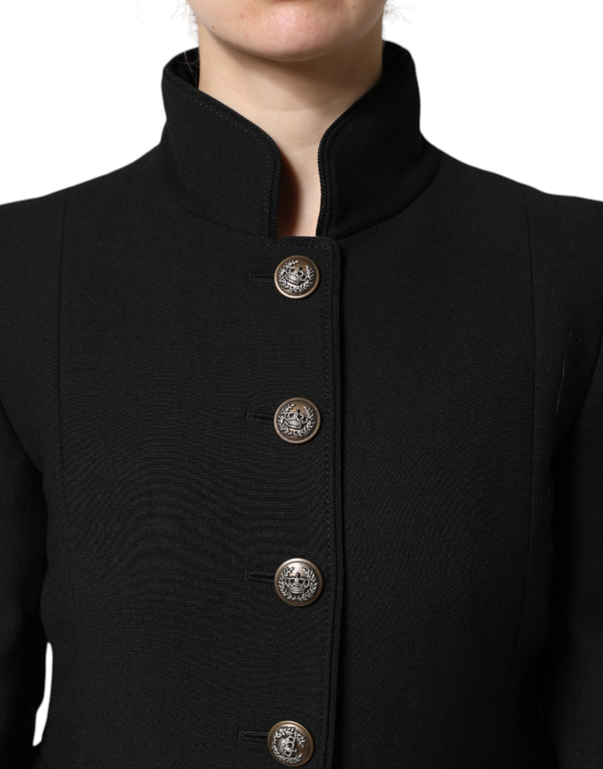 Indulge in the exquisite Dolce & Gabbana Black Wool Single Breasted Trench Coat, a timeless masterpiece of Italian craftsmanship that elevates your elegance and allure.