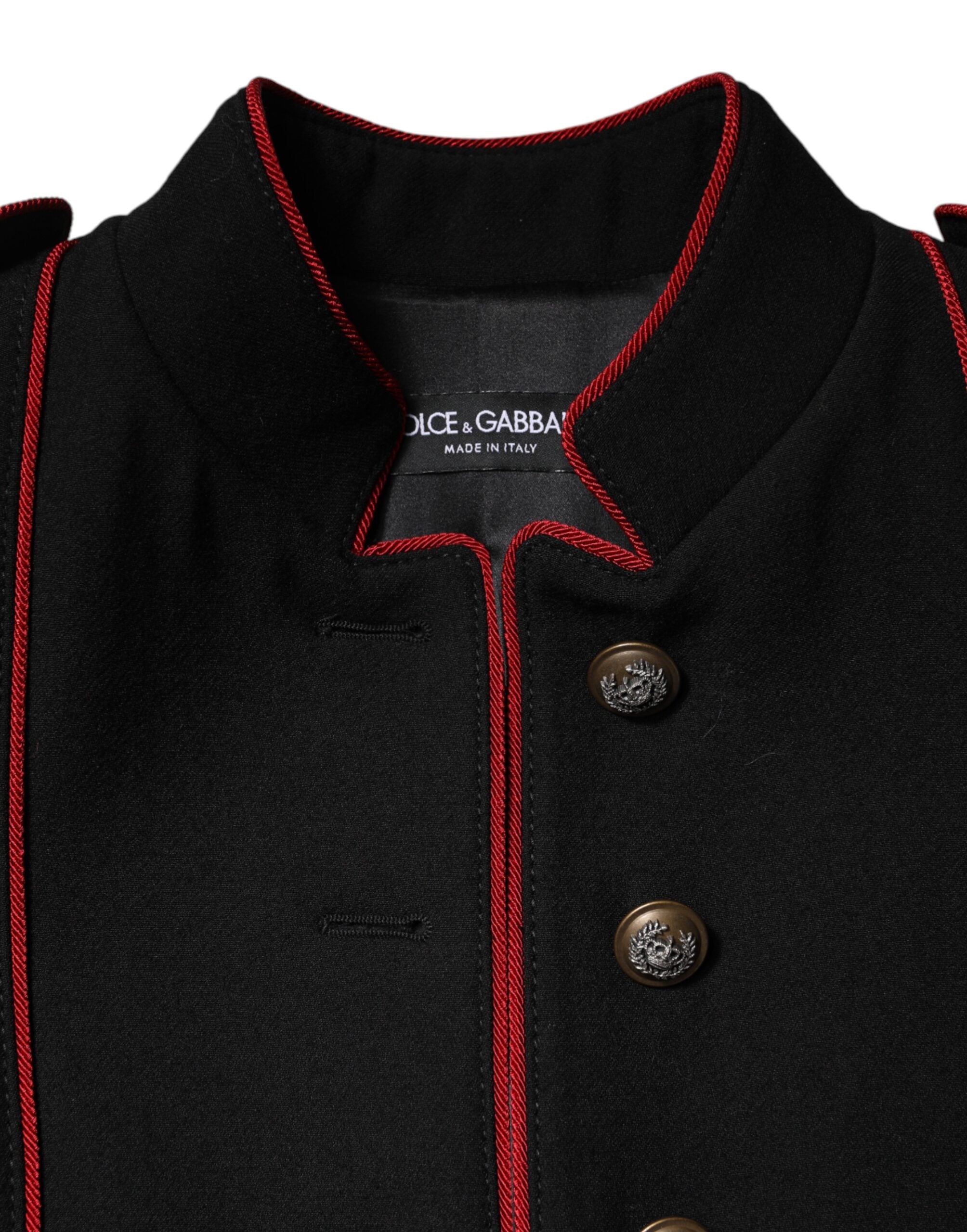 Elevate your wardrobe with the Dolce & Gabbana Black Wool Single Breasted Trench Coat, a masterpiece of Italian craftsmanship that embodies timeless elegance and luxurious comfort.