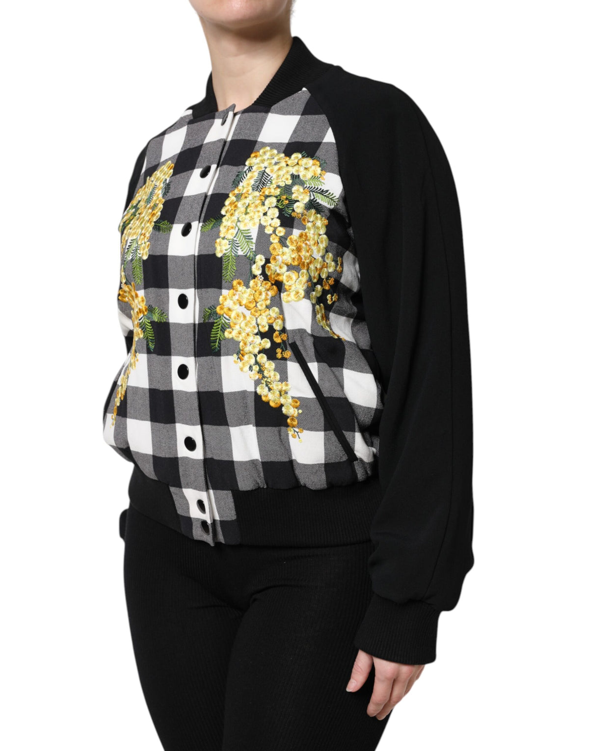 Elevate your wardrobe with the Dolce & Gabbana Black White Check Floral Button Down Jacket, a masterpiece of Italian craftsmanship that embodies timeless elegance and sophisticated allure.