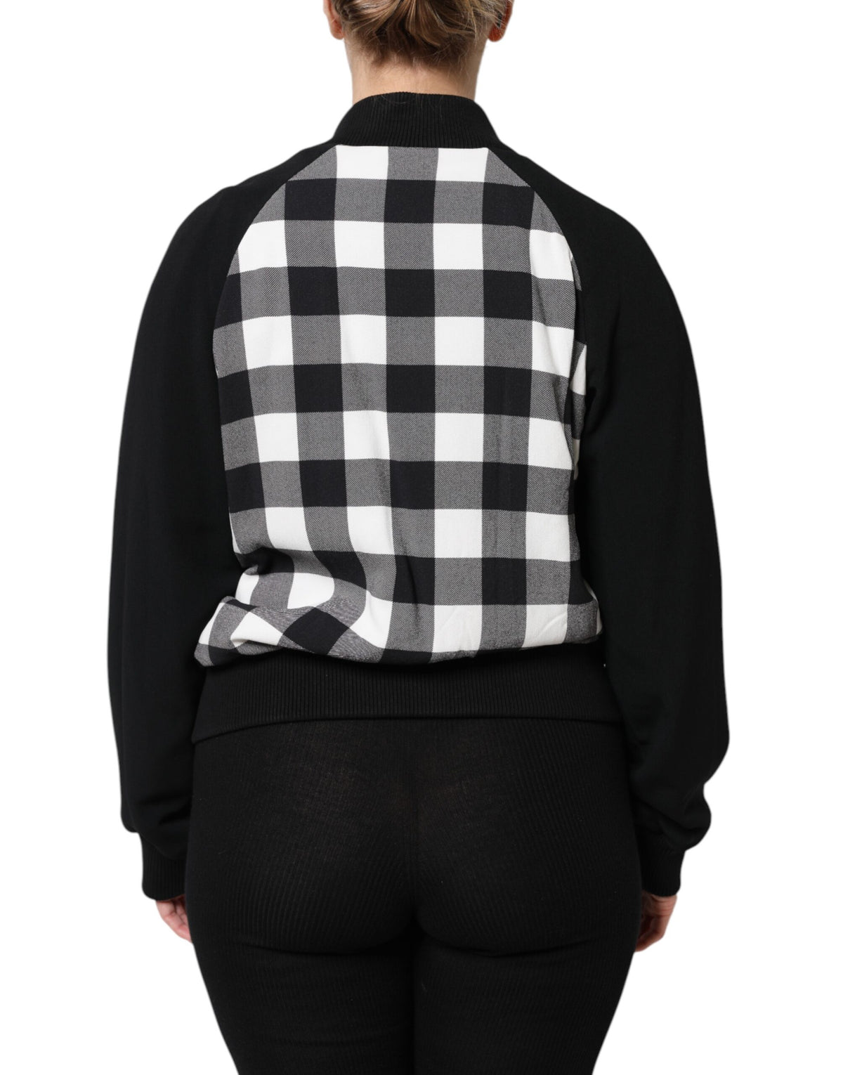 Elevate your wardrobe with the Dolce & Gabbana Black White Check Floral Button Down Jacket, a masterpiece of exquisite craftsmanship and luxurious fabrics, designed for those who embody timeless elegance.