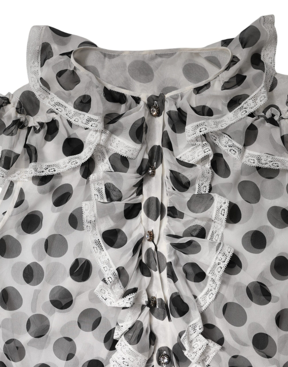 Elevate your wardrobe with the Dolce & Gabbana White Black Polka Dot Cotton Sleeveless Top, a masterpiece of Italian craftsmanship that embodies timeless elegance and refined sensuality.