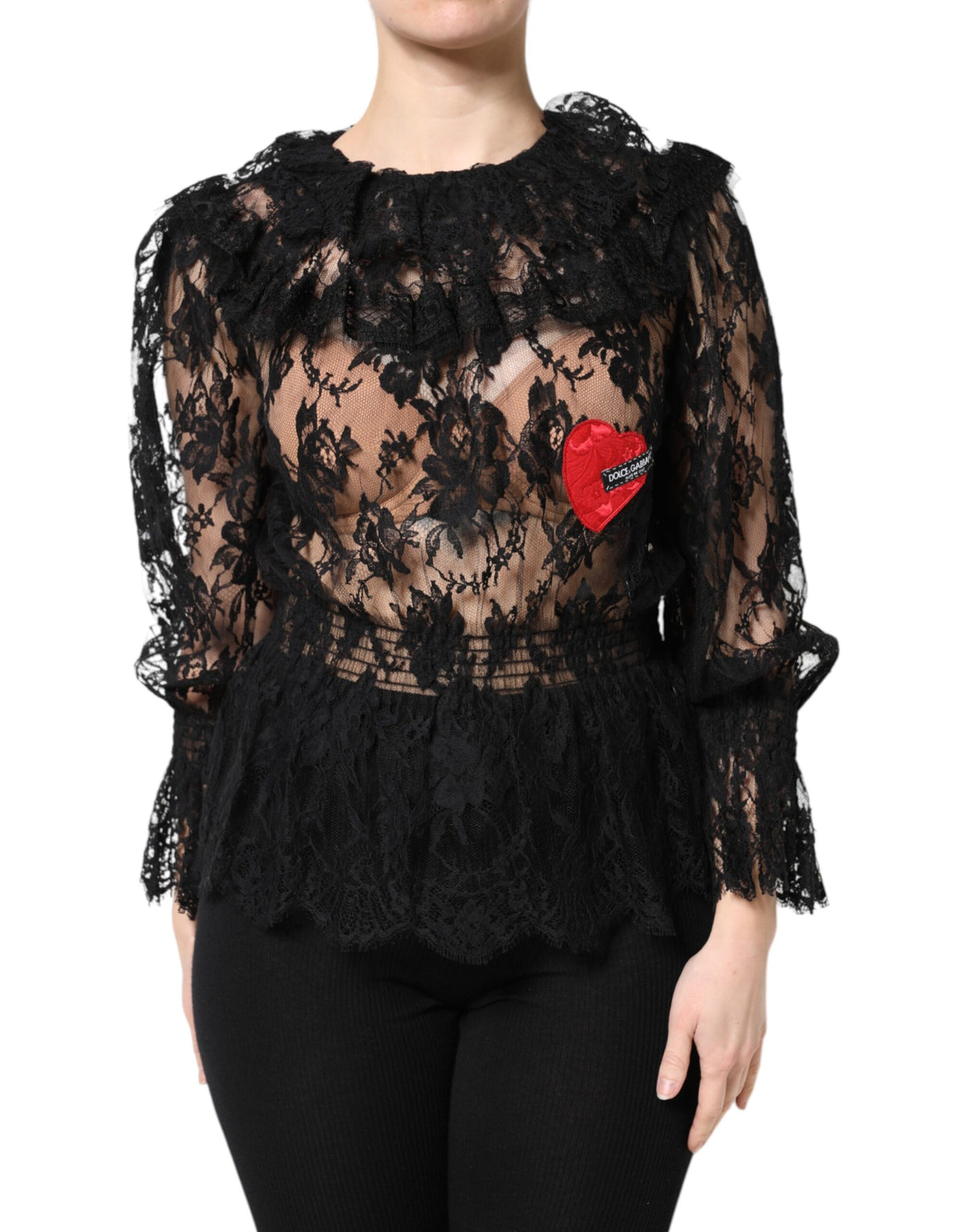 Indulge in the exquisite Dolce & Gabbana Black Cotton Floral Lace Blouse, where Italian craftsmanship meets modern elegance, perfect for any sophisticated occasion.