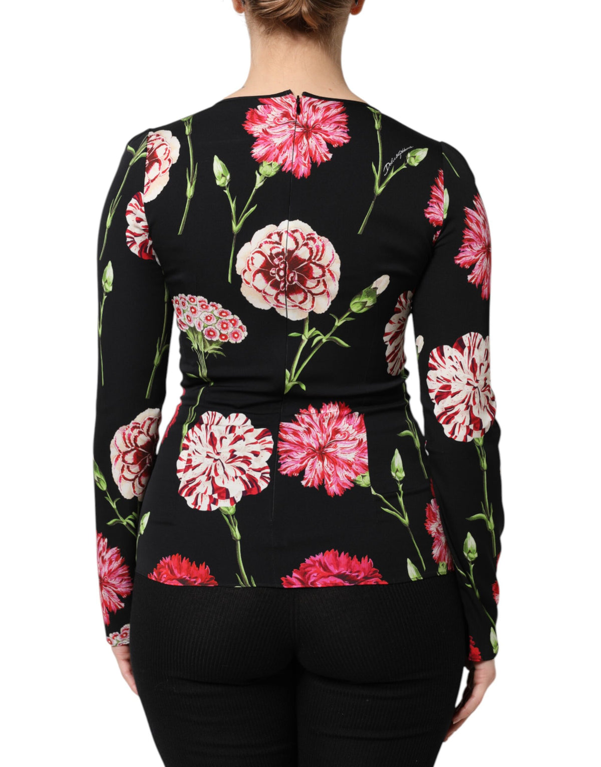 Elevate your elegance with the Dolce & Gabbana Black Floral Long Sleeve Blouse, a luxurious blend of silk and elastane that embodies Italian craftsmanship and timeless allure.