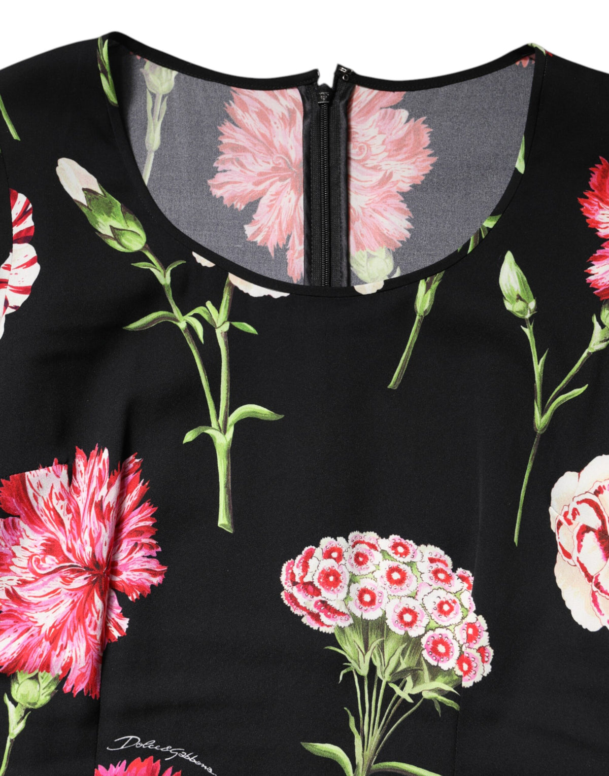 Elevate your elegance with the Dolce & Gabbana Black Floral Long Sleeve Blouse, a masterpiece of Italian craftsmanship in luxurious silk and elastane, perfect for any sophisticated occasion.