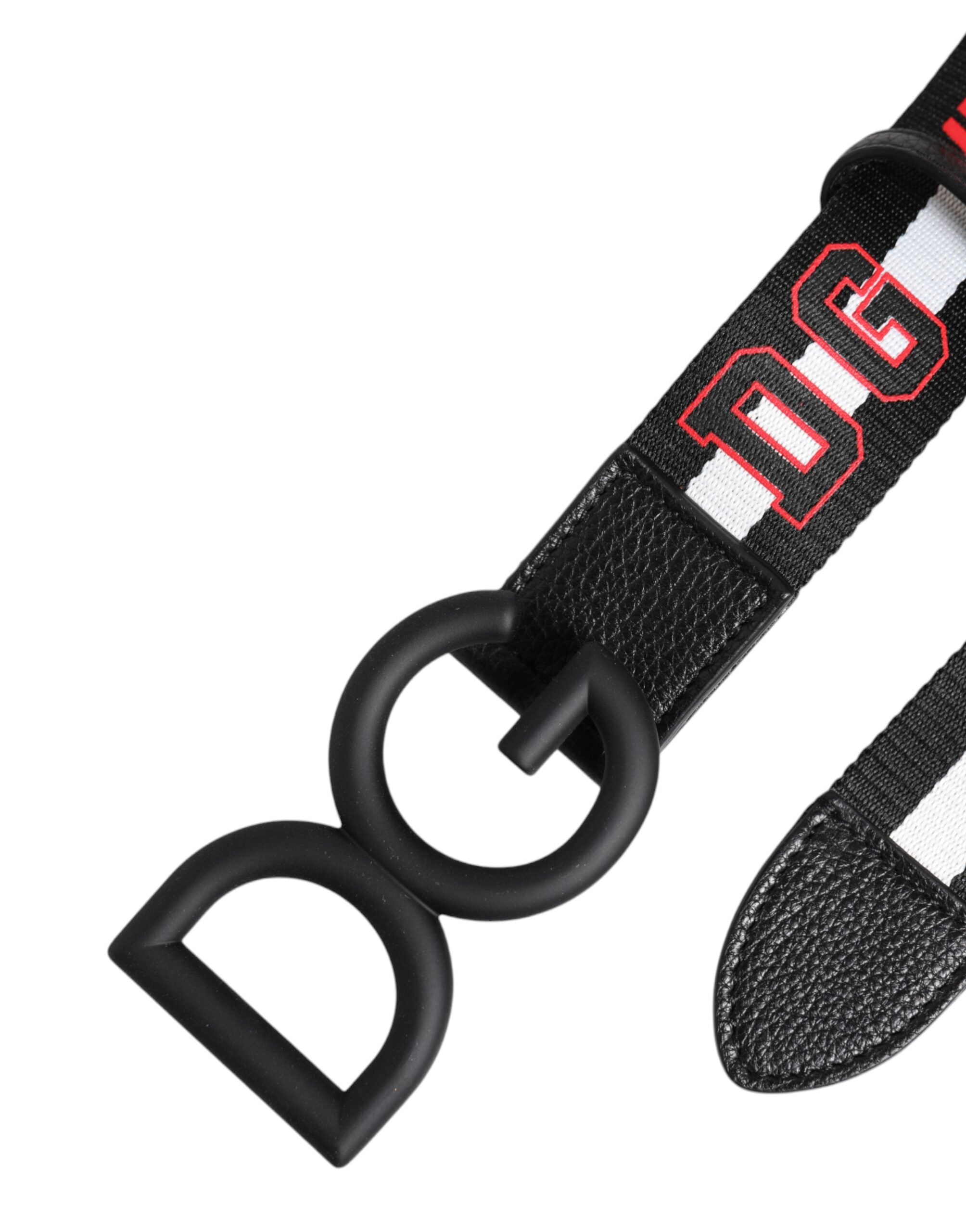 Indulge in the exquisite Dolce & Gabbana Black Polyester Logo Print DG Buckle Belt, a luxurious statement piece crafted in Italy, perfect for elevating any ensemble with timeless elegance.