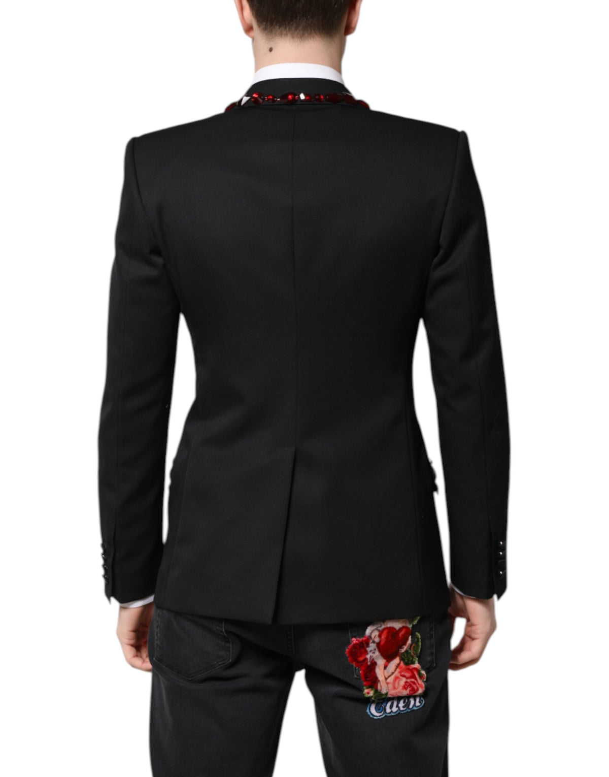 Elevate your style with the Dolce & Gabbana Black SICILIA Crystal Embellished Coat Blazer, a masterpiece of Italian craftsmanship in luxurious virgin wool and silk, perfect for the discerning fashion connoisseur.