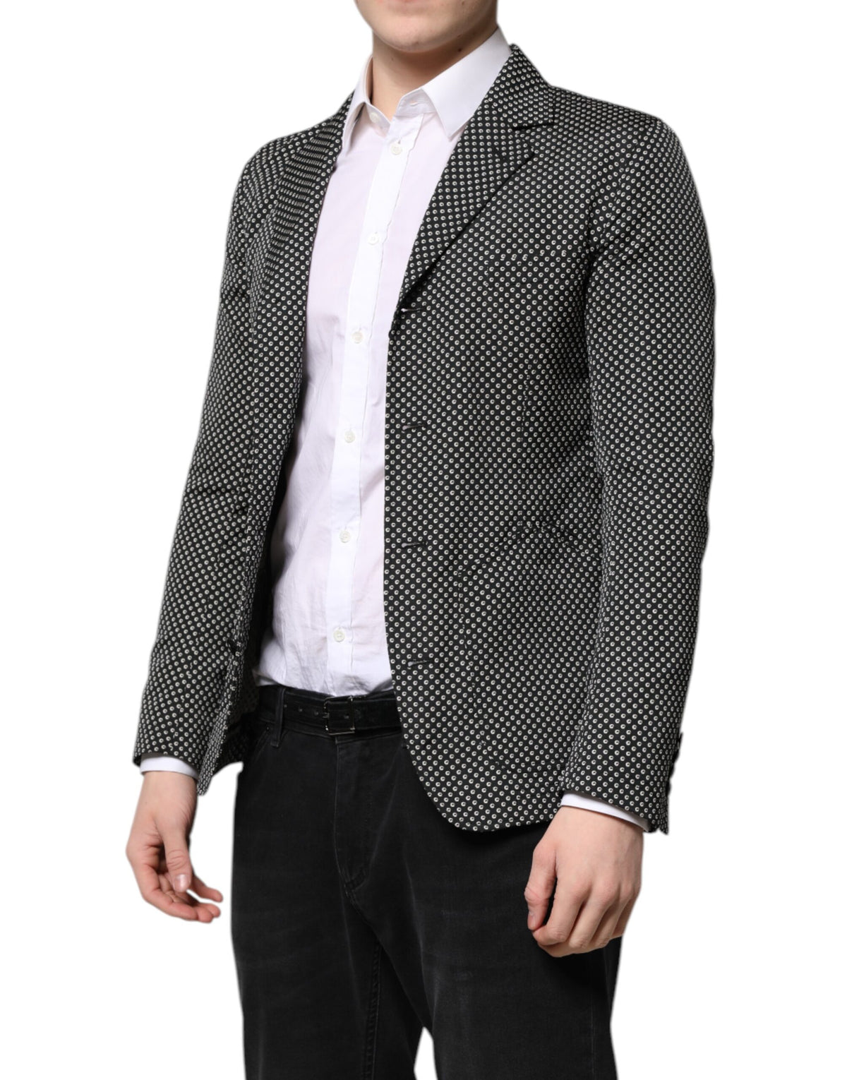 Indulge in the exquisite Dolce & Gabbana Black White Patterned Blazer, where luxurious materials and timeless craftsmanship elevate your sophisticated style for any occasion.