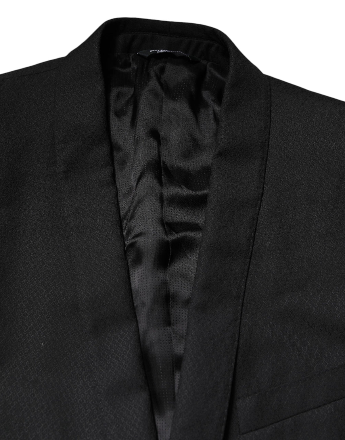 Experience the allure of the Dolce & Gabbana Black GOLD Single Breasted Suit Coat Blazer, a masterpiece in 100% virgin wool, epitomizing luxury and sophistication.