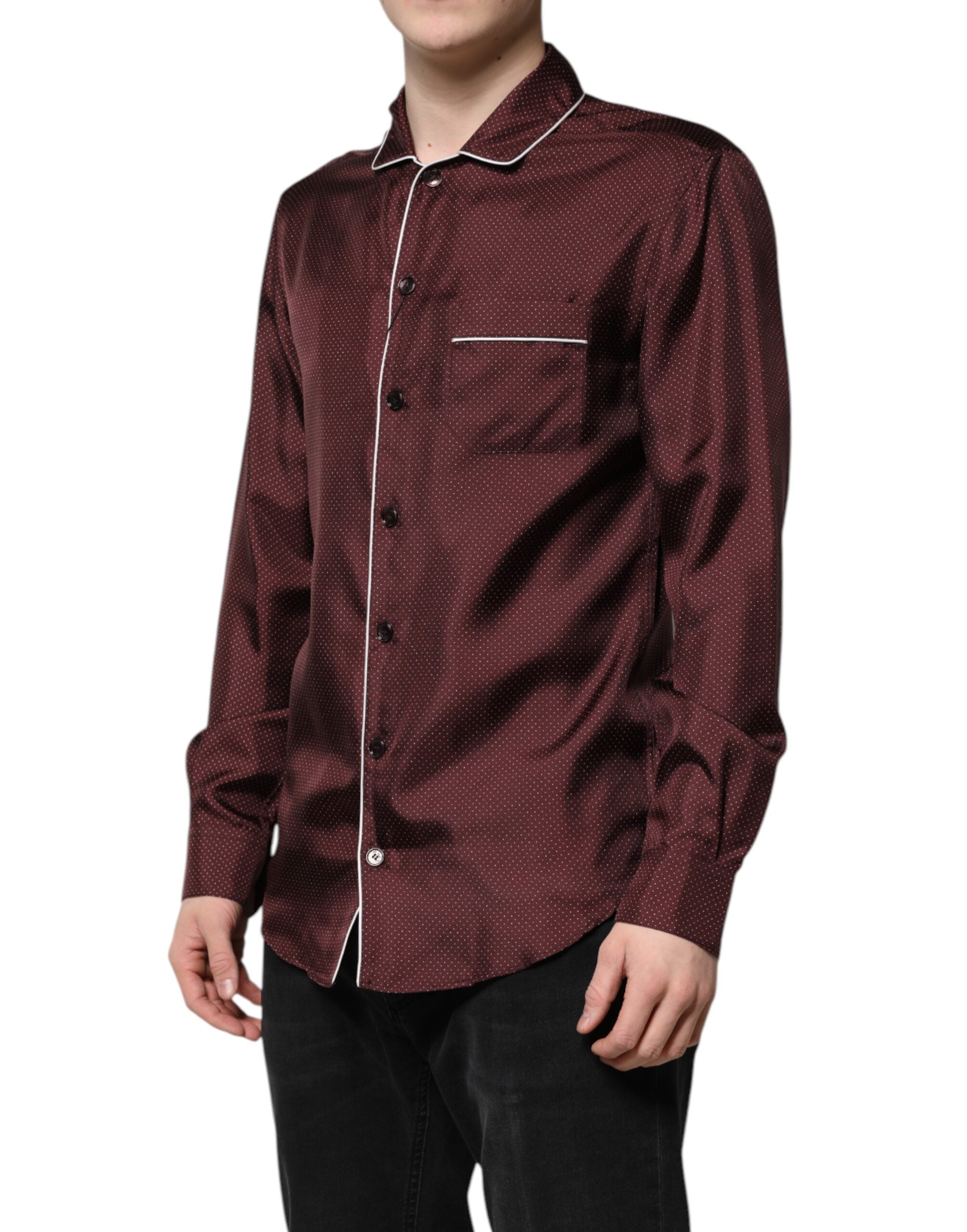 Elevate your elegance with the Dolce & Gabbana Burgundy Silk Dotted Long Sleeves Shirt, a masterpiece of Italian craftsmanship that embodies luxury and sophistication.