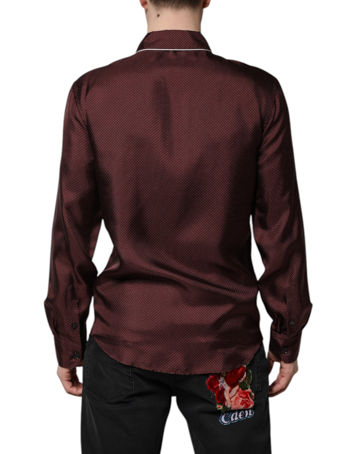 Indulge in the Dolce & Gabbana Burgundy Silk Dotted Long Sleeves Shirt, a masterpiece of Italian craftsmanship that embodies refined elegance and versatile sophistication.