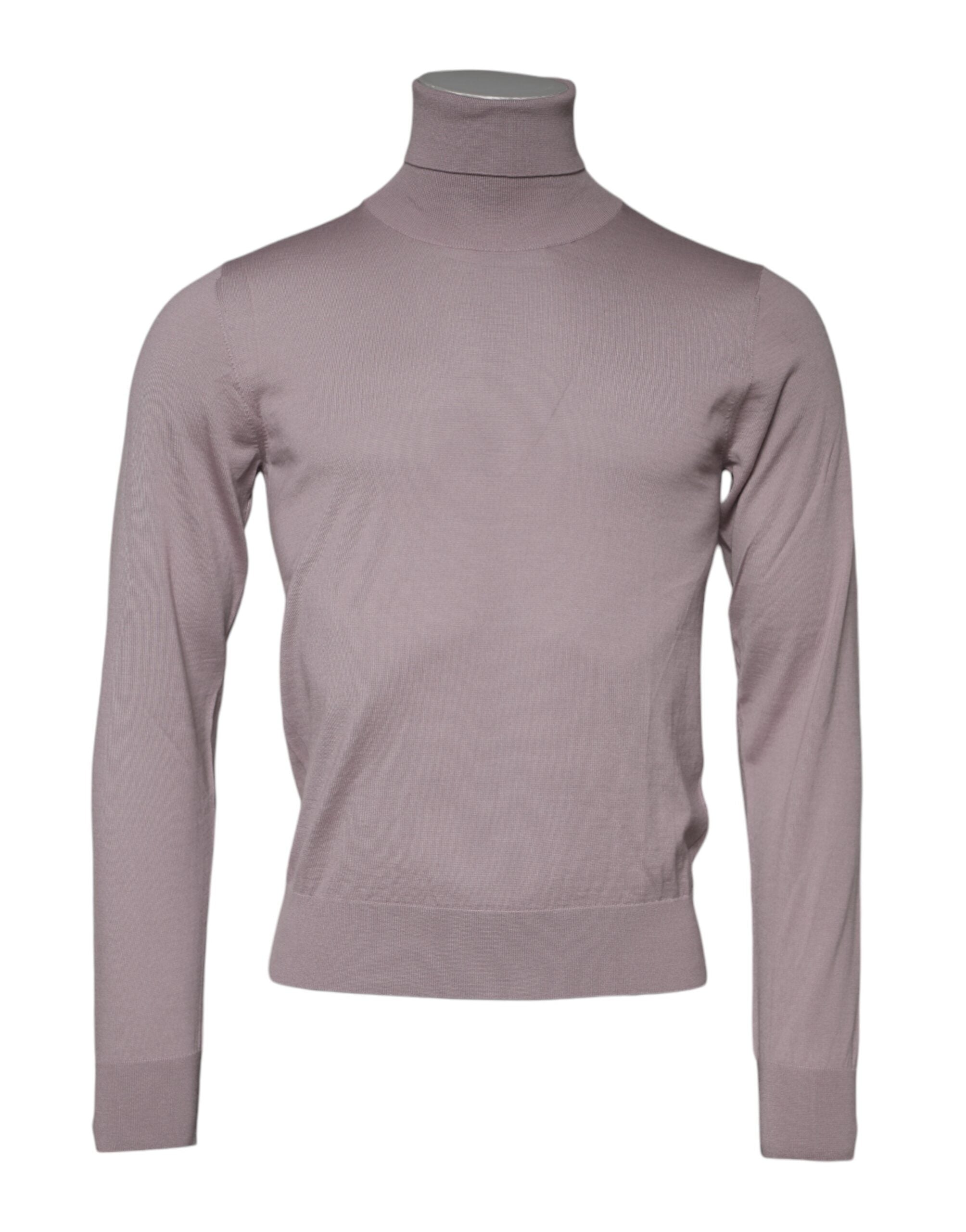 Indulge in the Dolce & Gabbana Brown Cashmere Knitted Pullover Sweater, a masterpiece of Italian craftsmanship that embodies timeless luxury and sophistication.