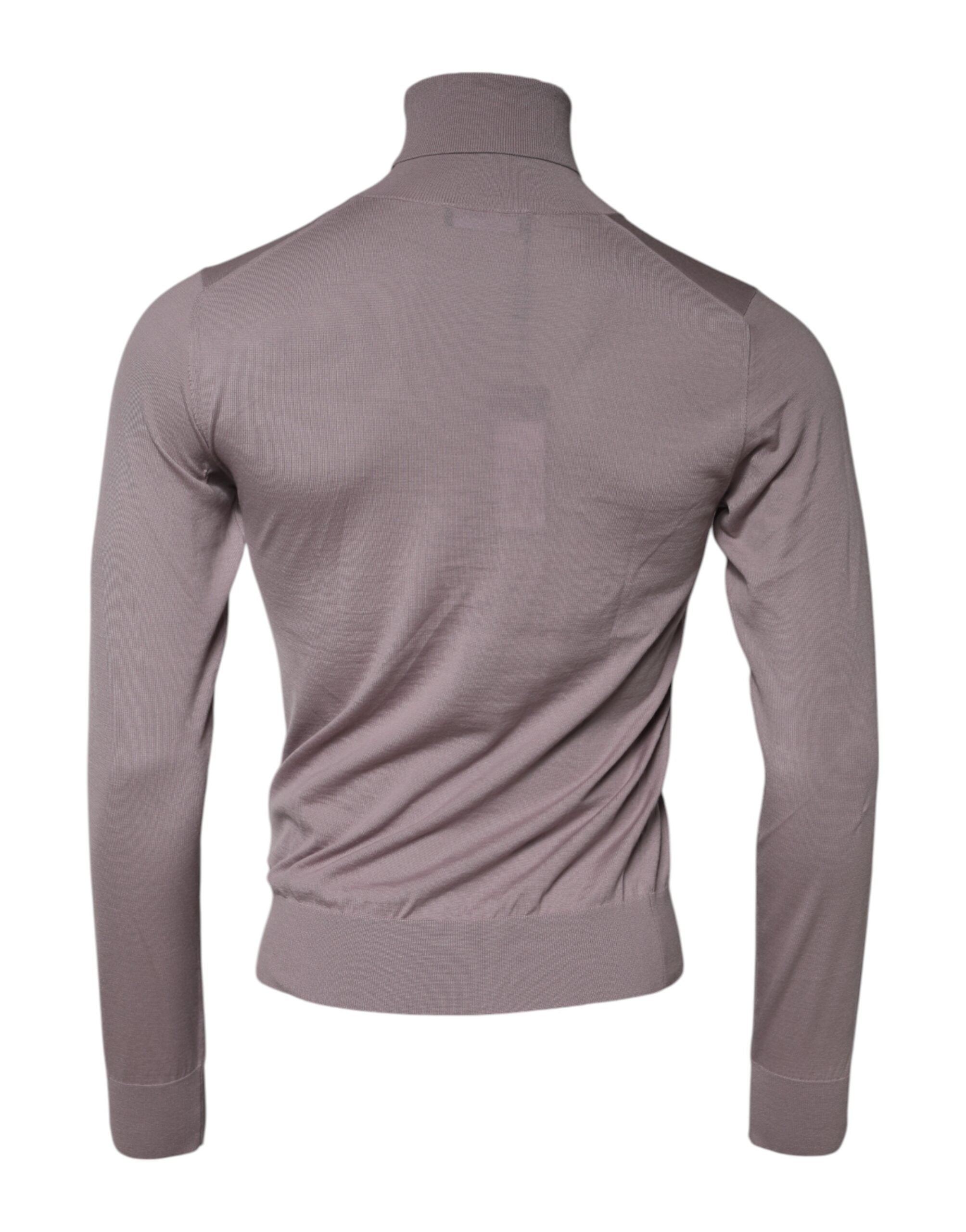 Indulge in the exquisite Dolce & Gabbana Brown Cashmere Knitted Pullover Sweater, a timeless piece crafted in Italy, embodying luxury and sophistication for the discerning individual.