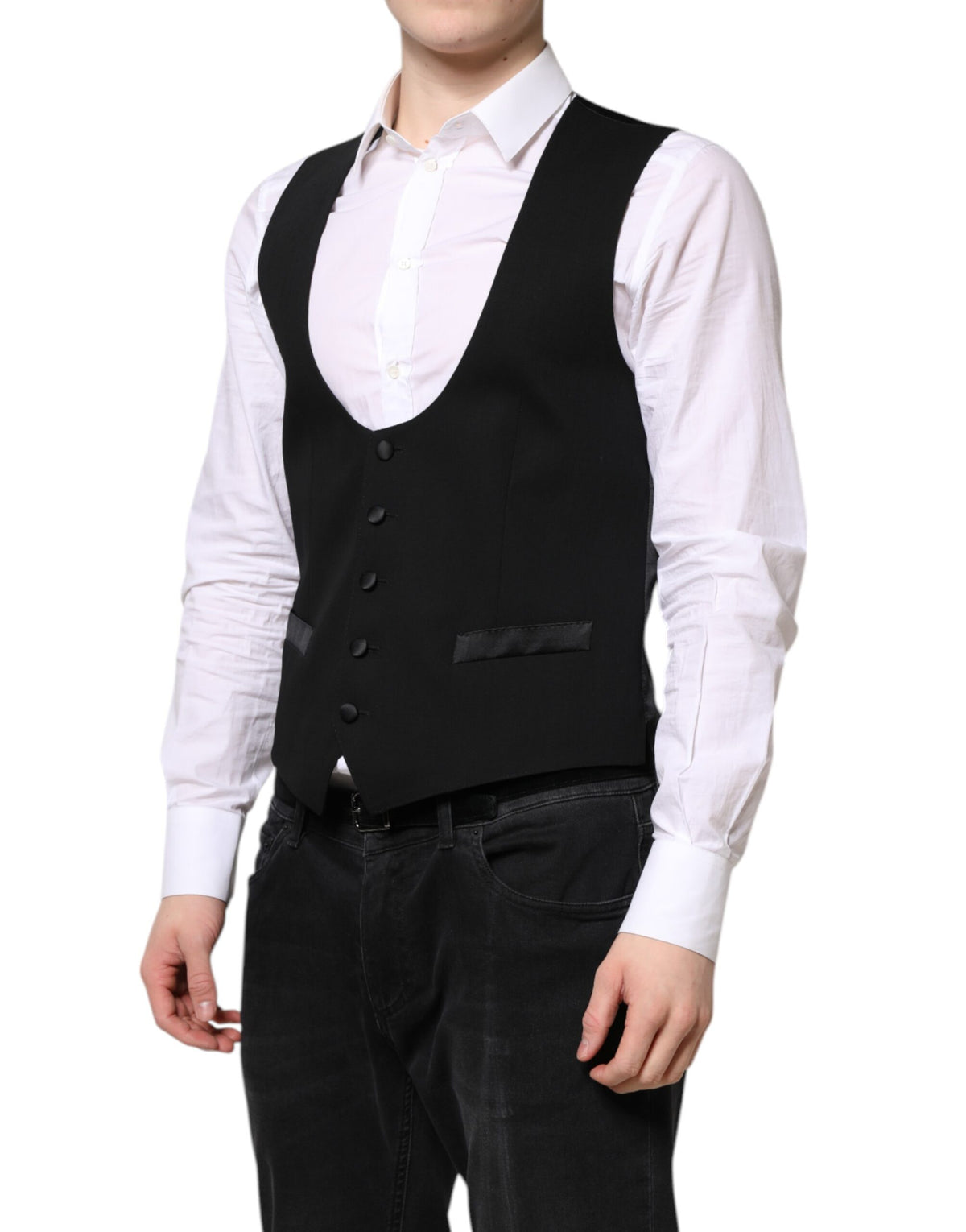 Elevate your wardrobe with the Dolce & Gabbana Black Wool Waistcoat Dress Formal Vest, a masterpiece of exquisite craftsmanship and luxurious materials, perfect for the discerning individual.