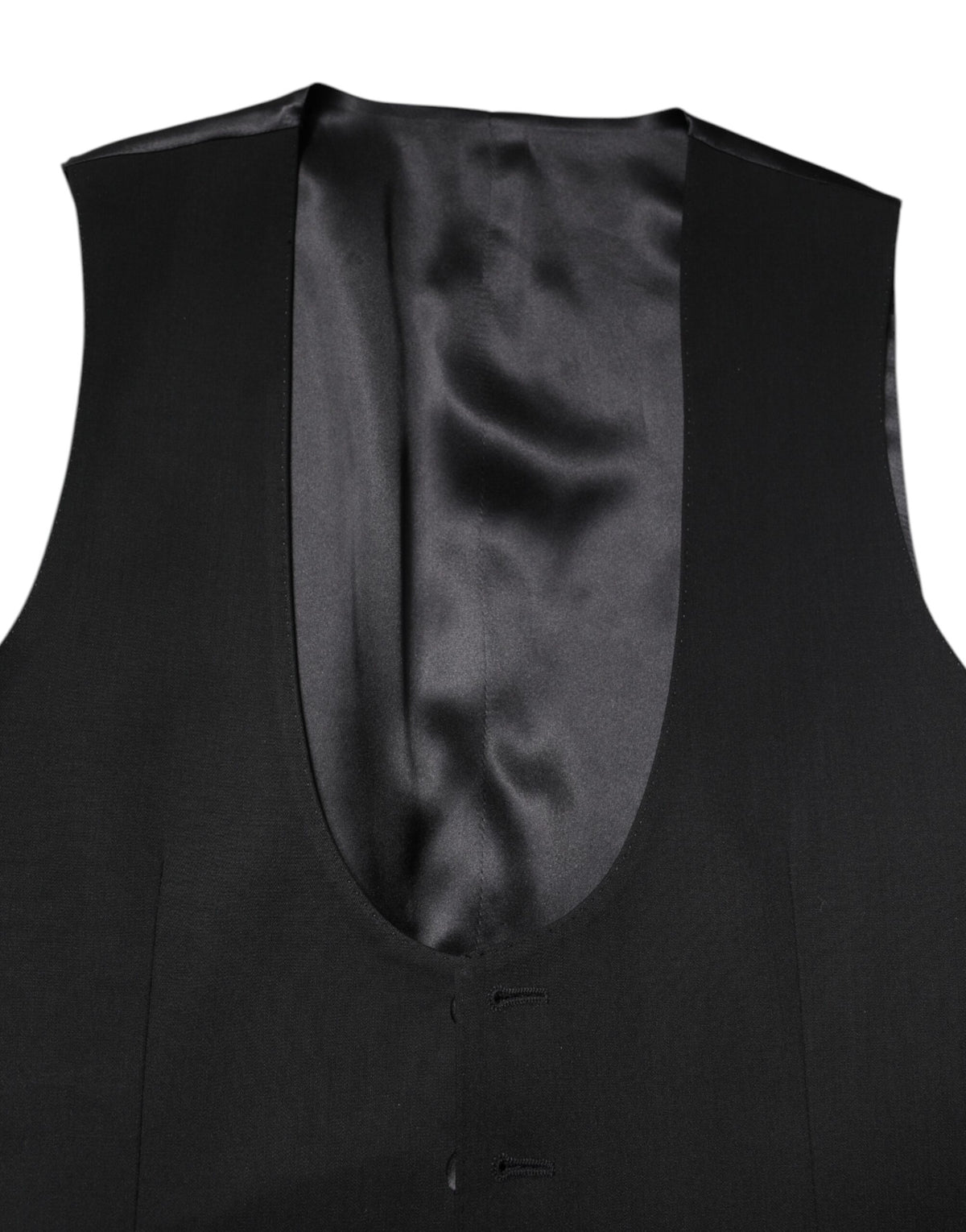 Elevate your wardrobe with the Dolce & Gabbana Black Wool Waistcoat Dress Formal Vest, a masterpiece of exquisite craftsmanship and luxurious materials, embodying timeless elegance.