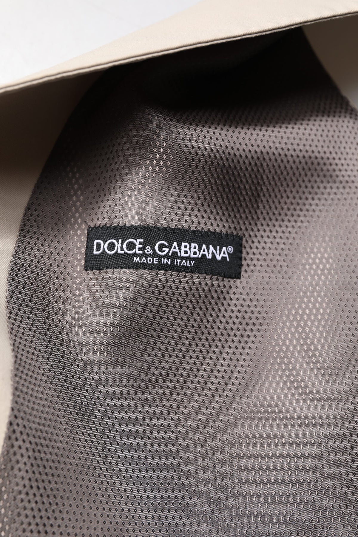 Elevate your elegance with the Dolce & Gabbana Beige Gray Dress Men Formal Waistcoat Vest, a masterpiece of Italian craftsmanship that embodies timeless sophistication and allure.