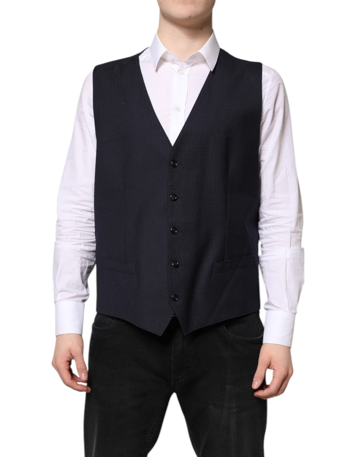 Indulge in the exquisite Dolce & Gabbana Black Wool Waistcoat, a timeless blend of virgin wool and silk, embodying luxury and sophistication for every discerning individual.
