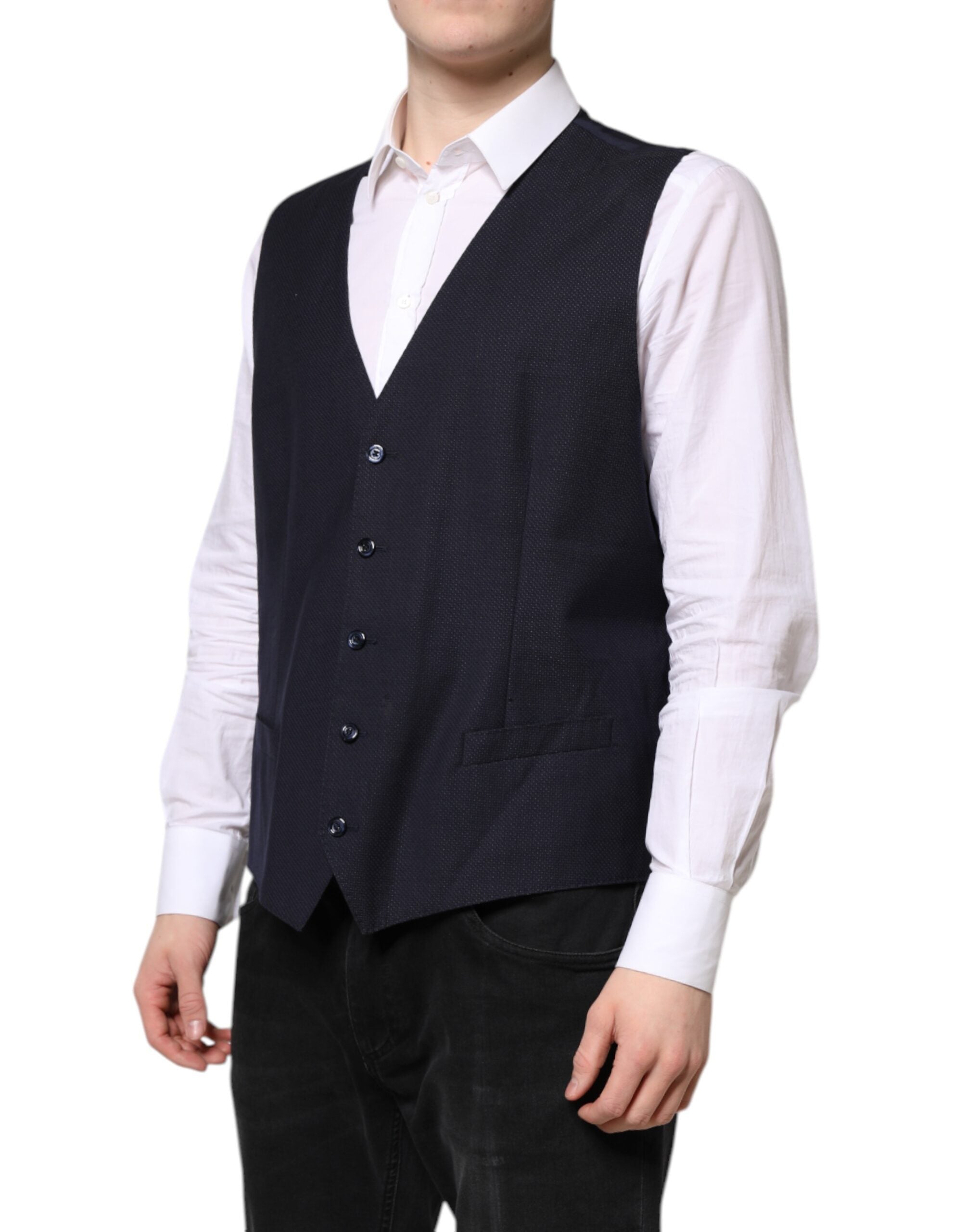 Indulge in the exquisite Dolce & Gabbana Black Wool Waistcoat, a timeless blend of virgin wool and silk, embodying luxury and sophistication for the discerning connoisseur.