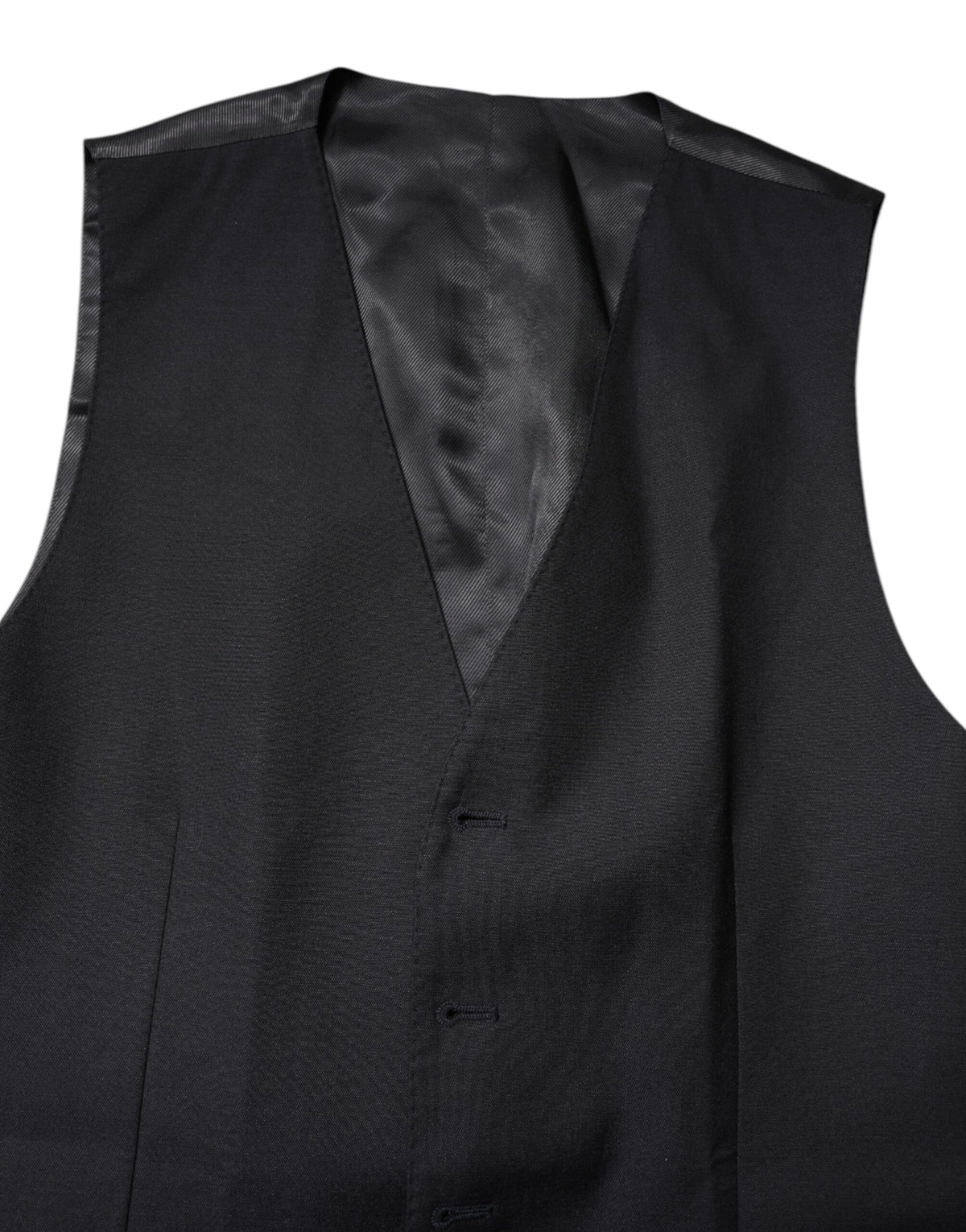 Experience the allure of the Dolce & Gabbana Black Wool Waistcoat Dress Formal Vest, a luxurious blend of virgin wool and silk, embodying timeless elegance and exquisite craftsmanship.