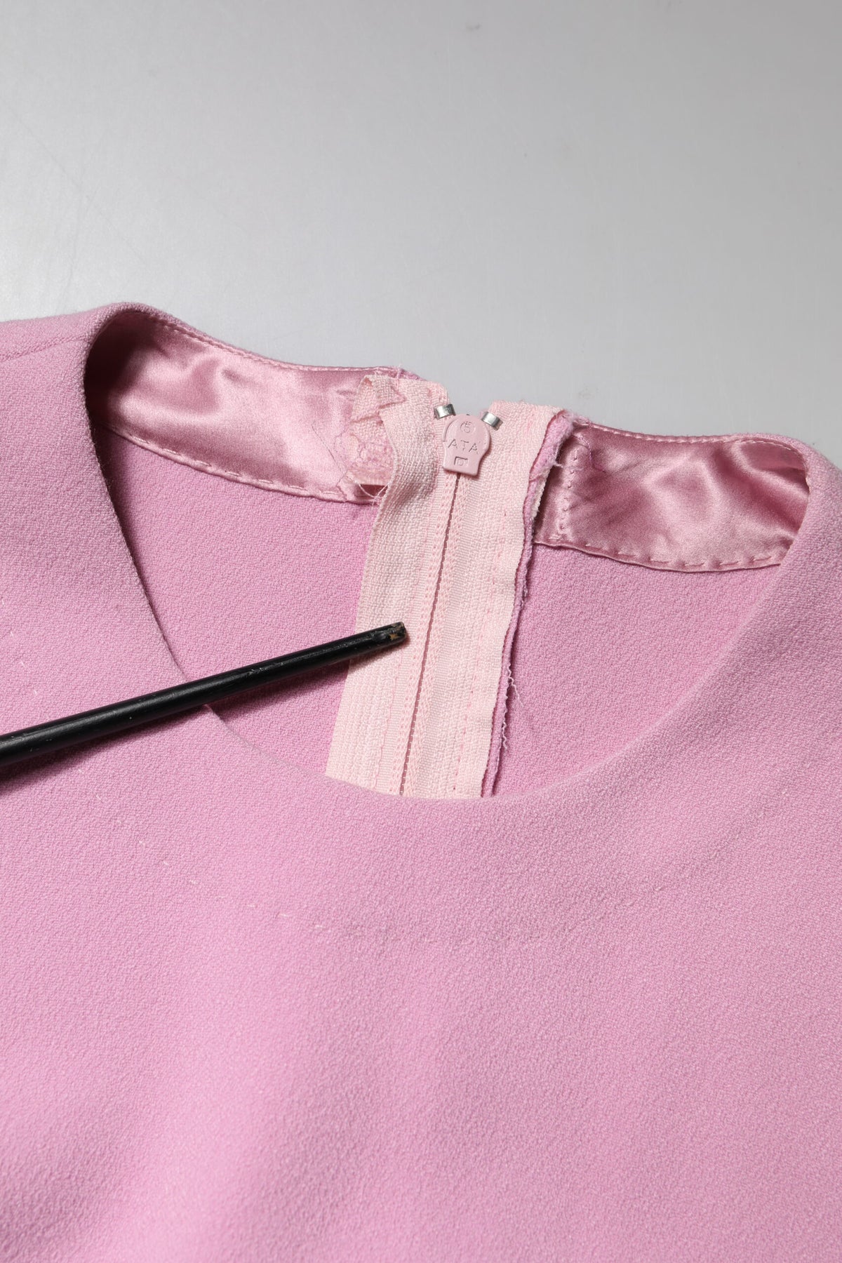 Indulge in the exquisite craftsmanship of the Dolce & Gabbana Pink Long Sleeves Sheath Mini Dress, a luxurious blend of elegance and allure, perfect for any sophisticated occasion.