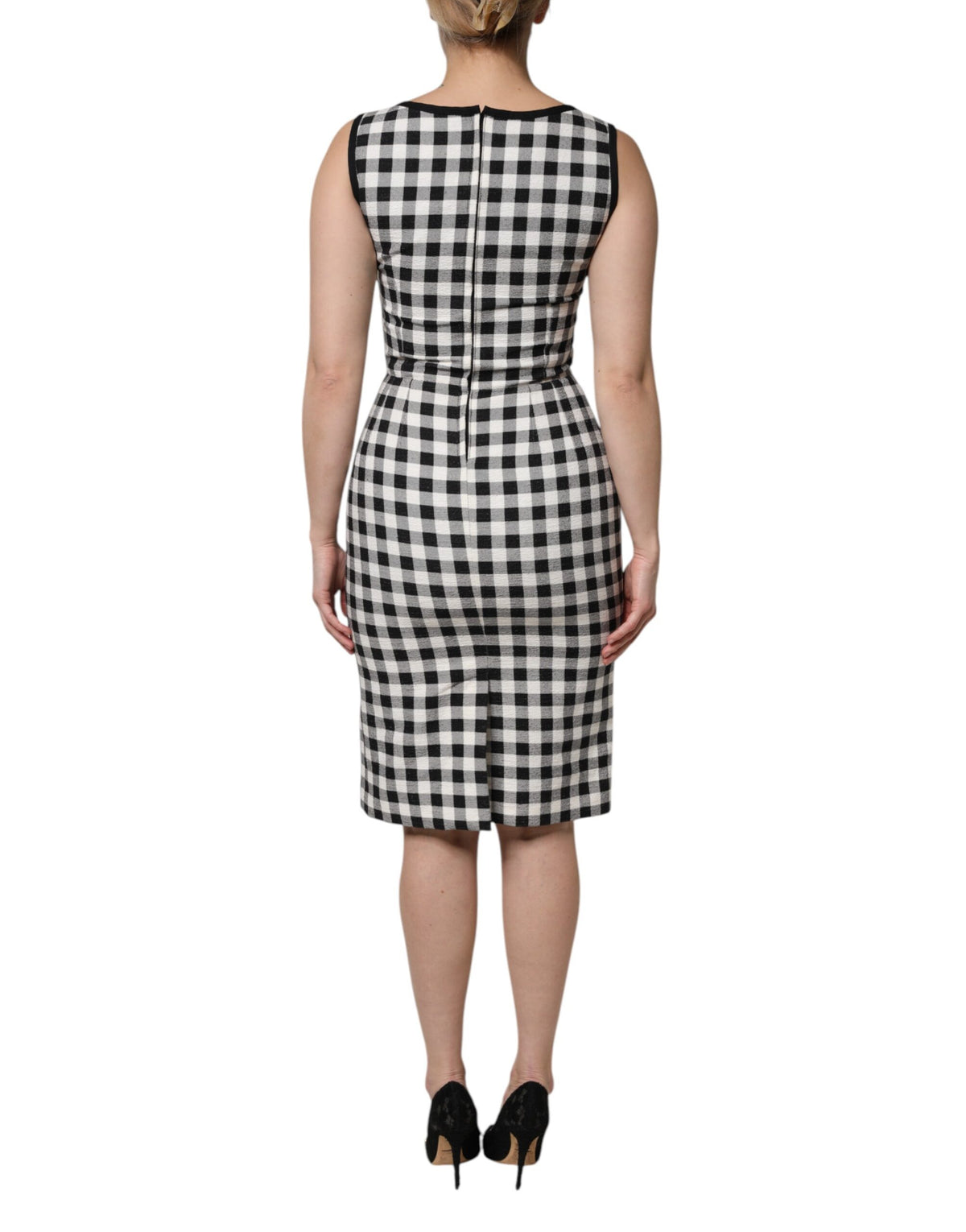 Elevate your wardrobe with the Dolce & Gabbana White Black Checkered Sleeveless Sheath Dress, a masterpiece of Italian craftsmanship in luxurious cotton and silk, embodying timeless elegance.