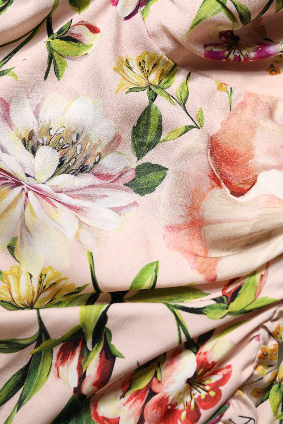 Experience the allure of the Dolce & Gabbana Pink Floral Silk Fit And Flared Midi Dress, a masterpiece of Italian craftsmanship that redefines timeless elegance and sophistication.