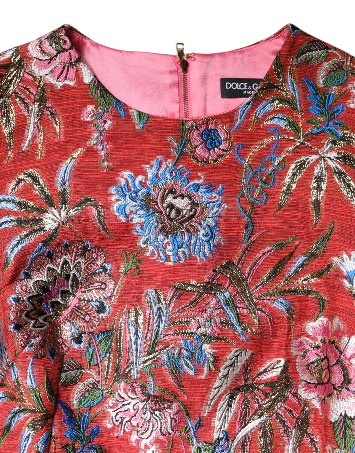 Experience the allure of the Dolce & Gabbana Red Floral Jacquard A-line Mini Dress, a testament to Italian craftsmanship that embodies elegance and sophistication for every occasion.