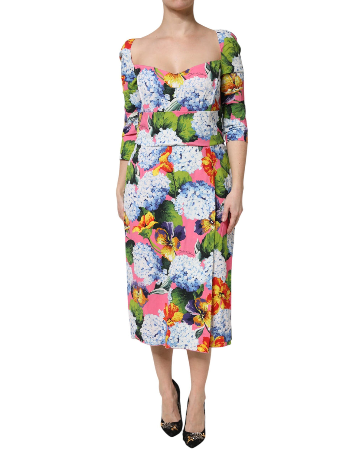 Elevate your wardrobe with the Dolce & Gabbana Multicolor Floral Pleated Sheath Midi Dress, a masterpiece of luxurious craftsmanship and timeless elegance, perfect for any sophisticated occasion.
