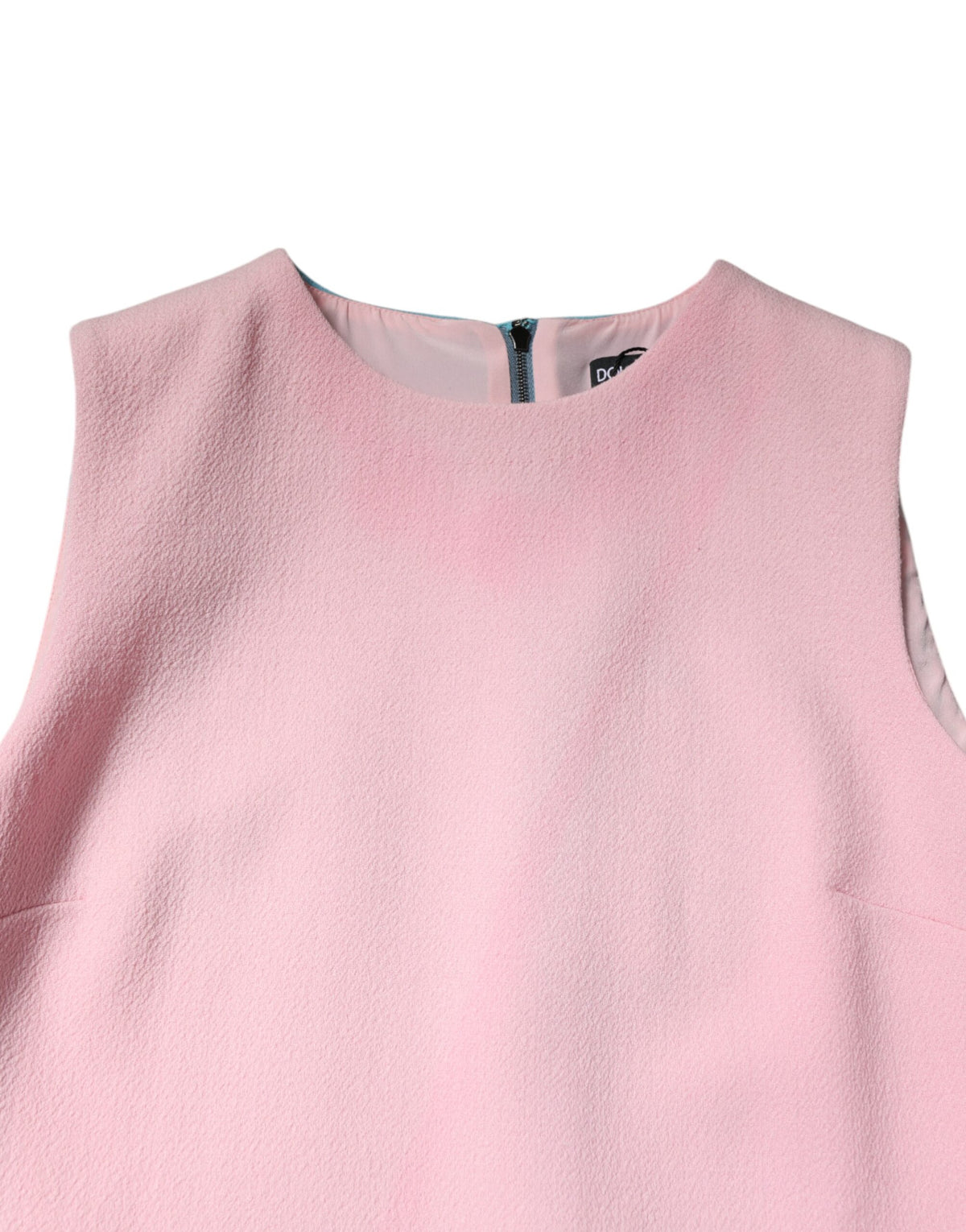 Experience the allure of the Dolce & Gabbana Pink Blue Wool Sleeveless Shift Mini Dress, a masterpiece of artisanal craftsmanship and luxurious materials, perfect for those who embrace elegance and individuality.